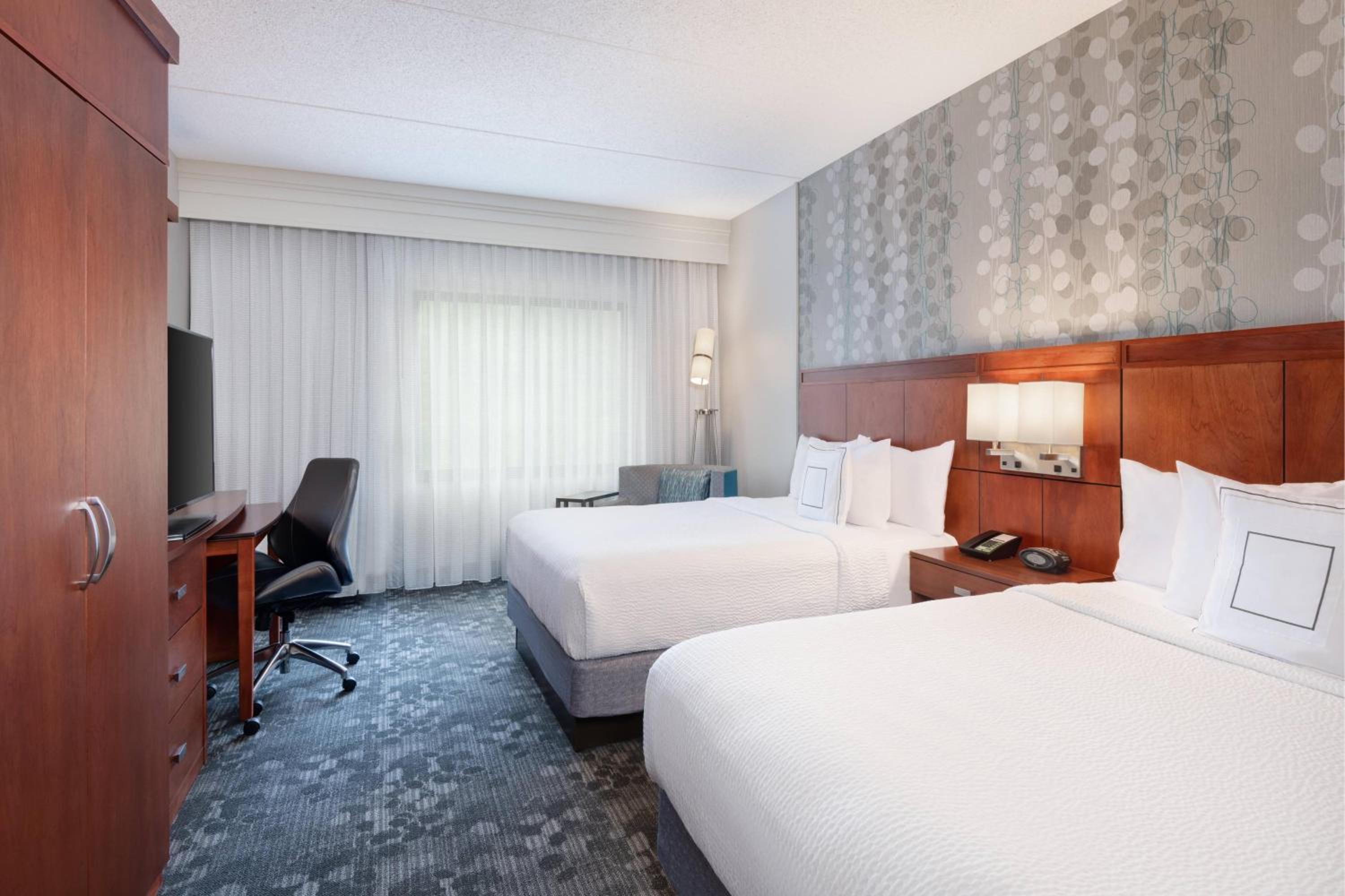 Queen Room with Two Queen Beds - Photo 1