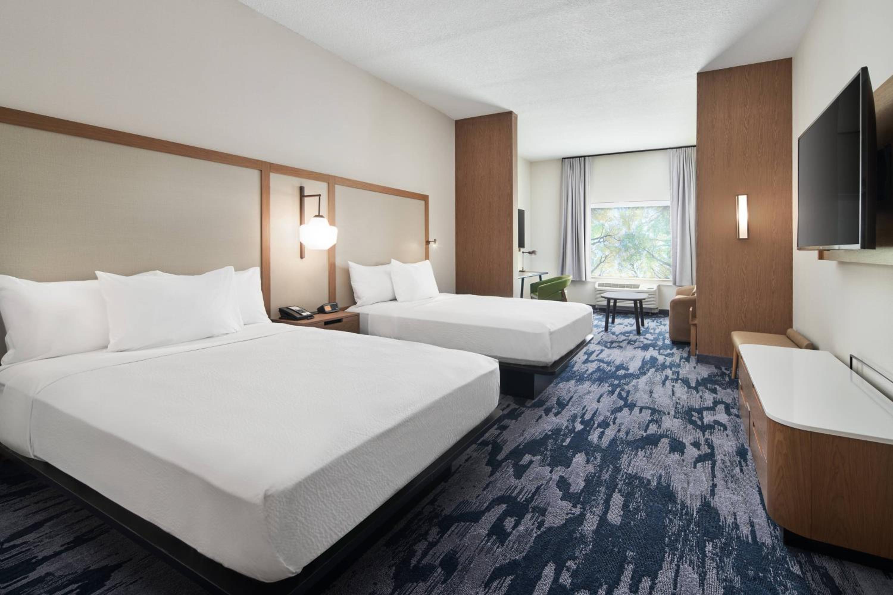 Queen Suite with Two Queen Beds and Sofa Bed - Photo 1