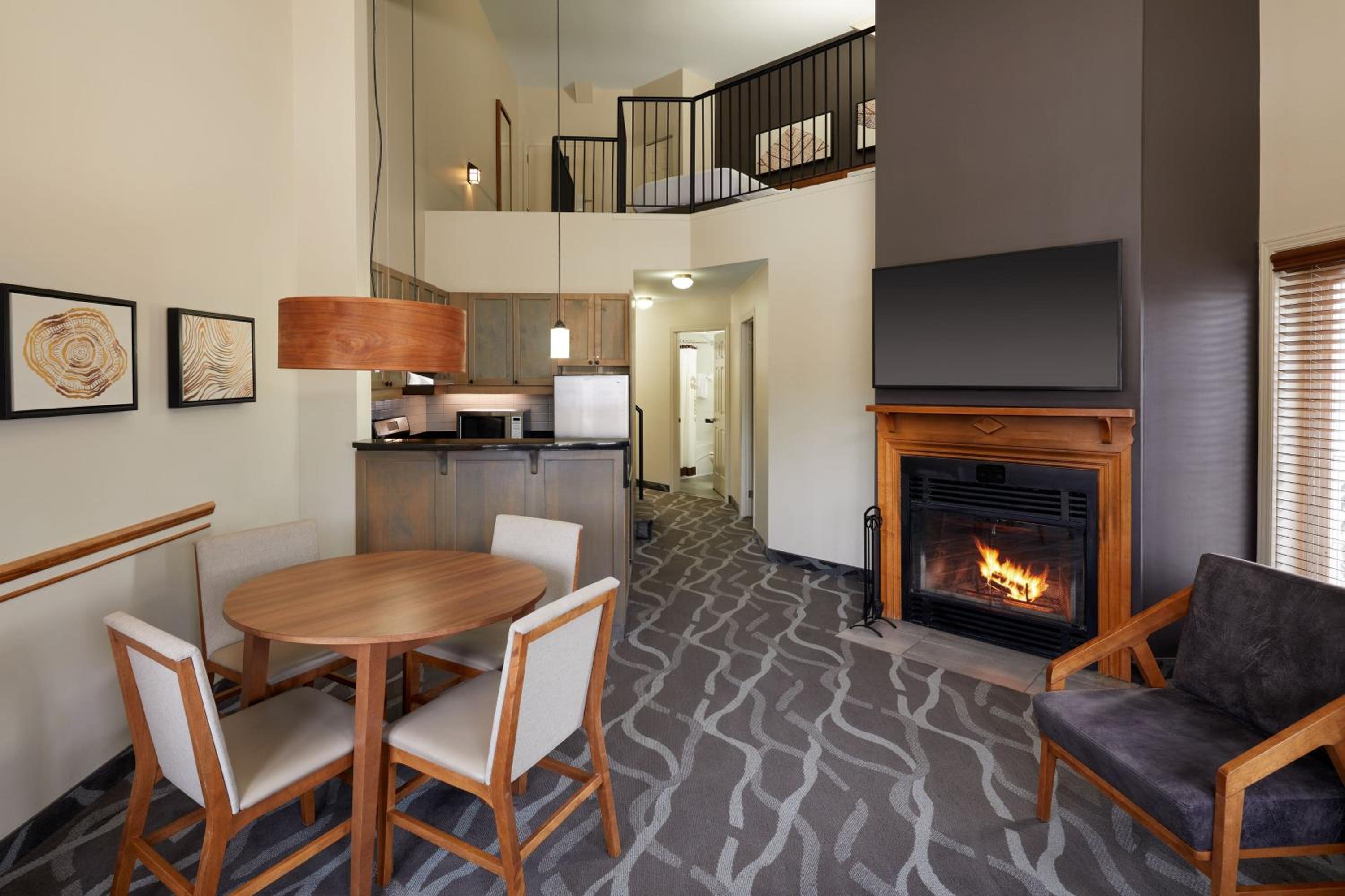 Two Bedroom Bi-Level Suite with Fireplace - Photo 1
