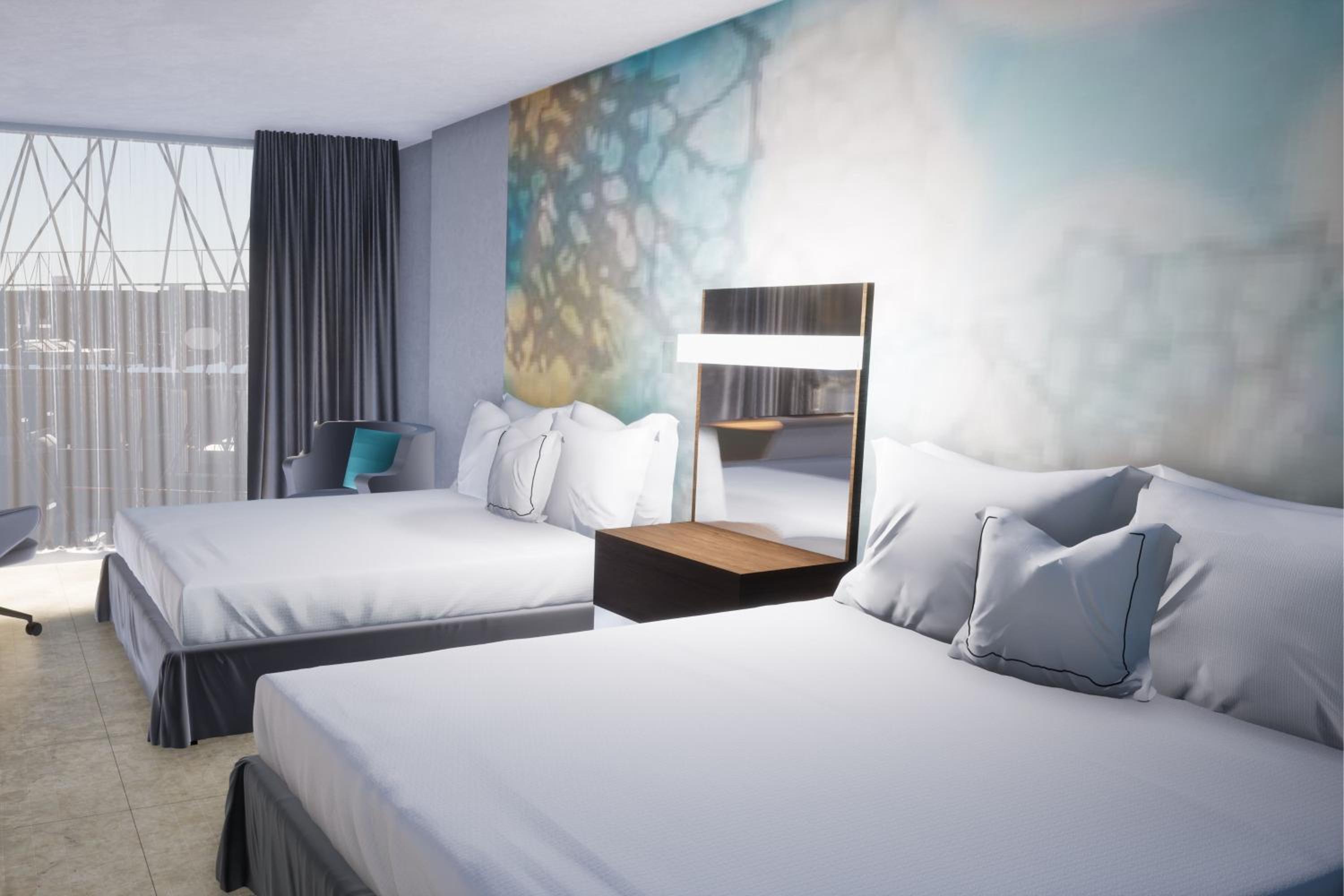 Queen Room with Two Queen Beds - Photo 6