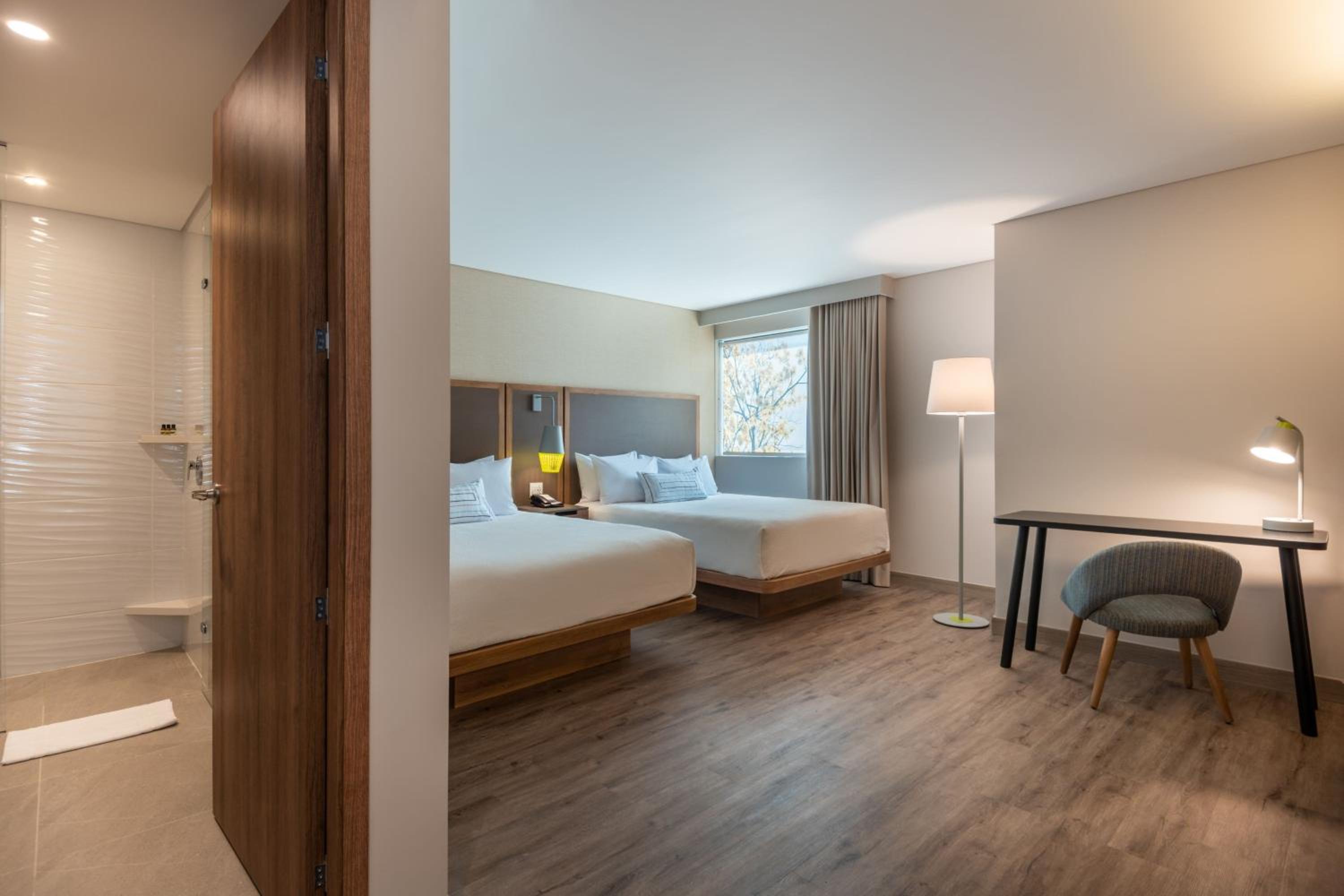 Queen Room with Two Queen Beds - Photo 1