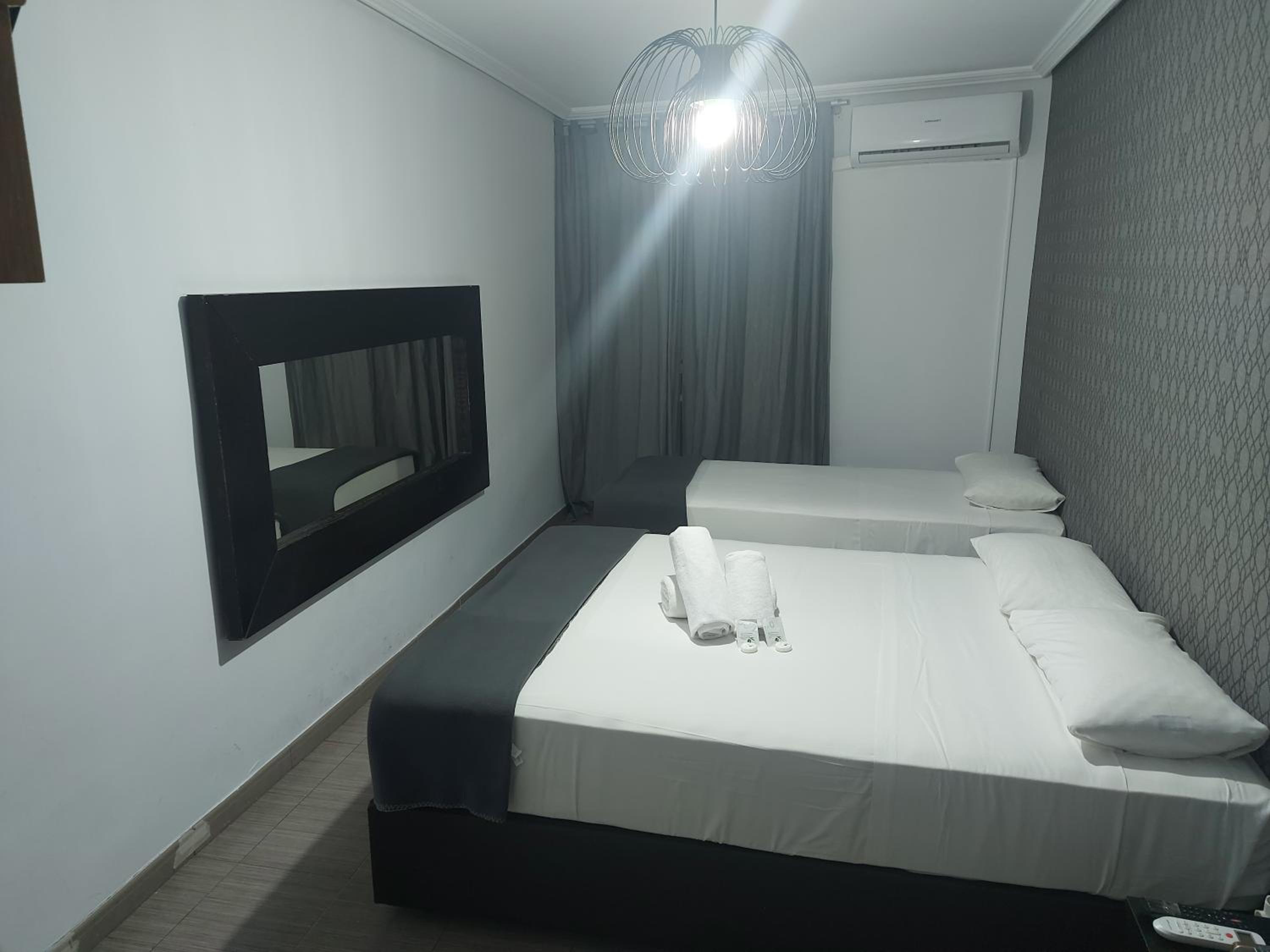 Habitación Triple con Balcón
