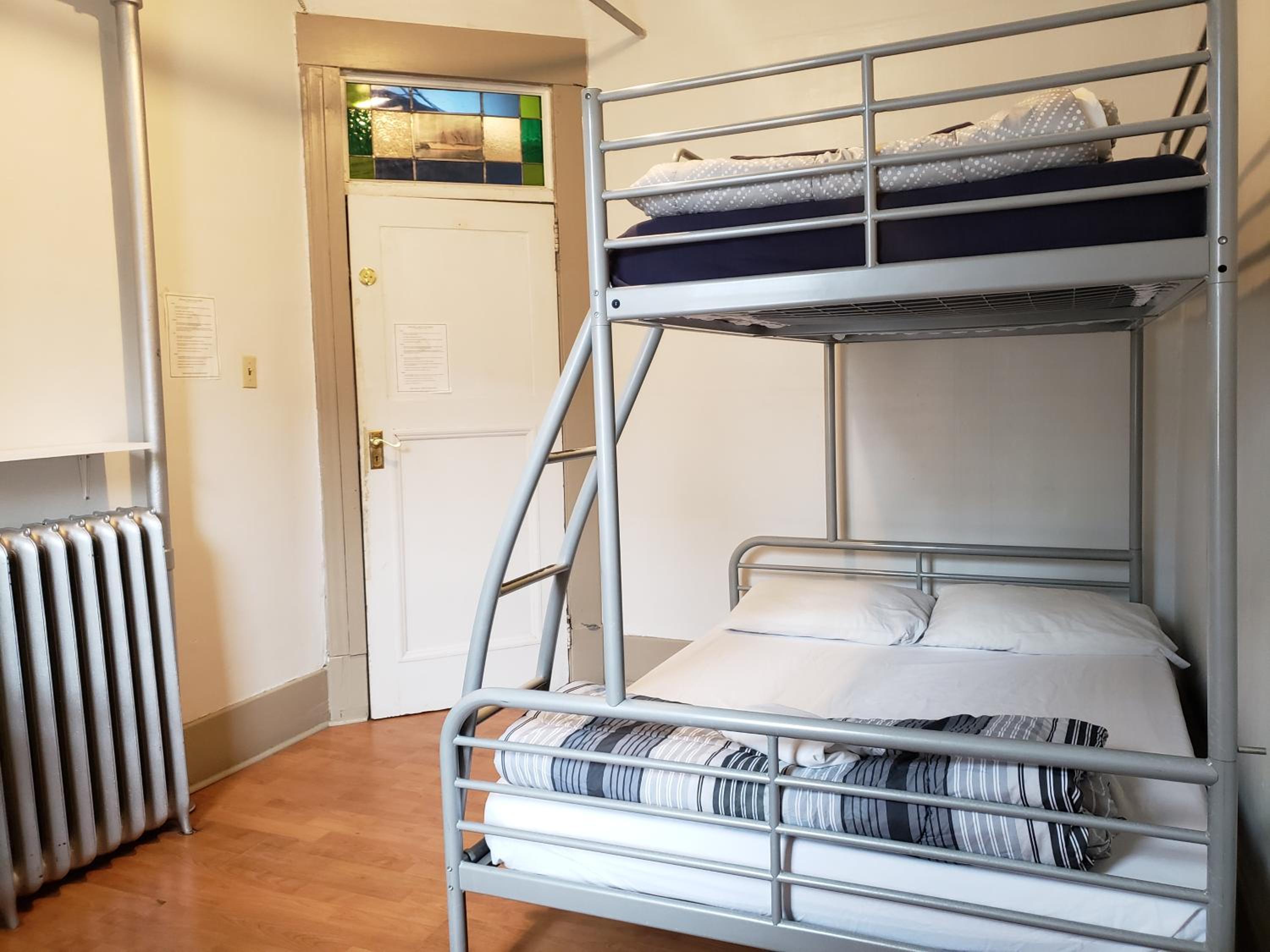 Triple Bunk with Shared Bathroom photo 3