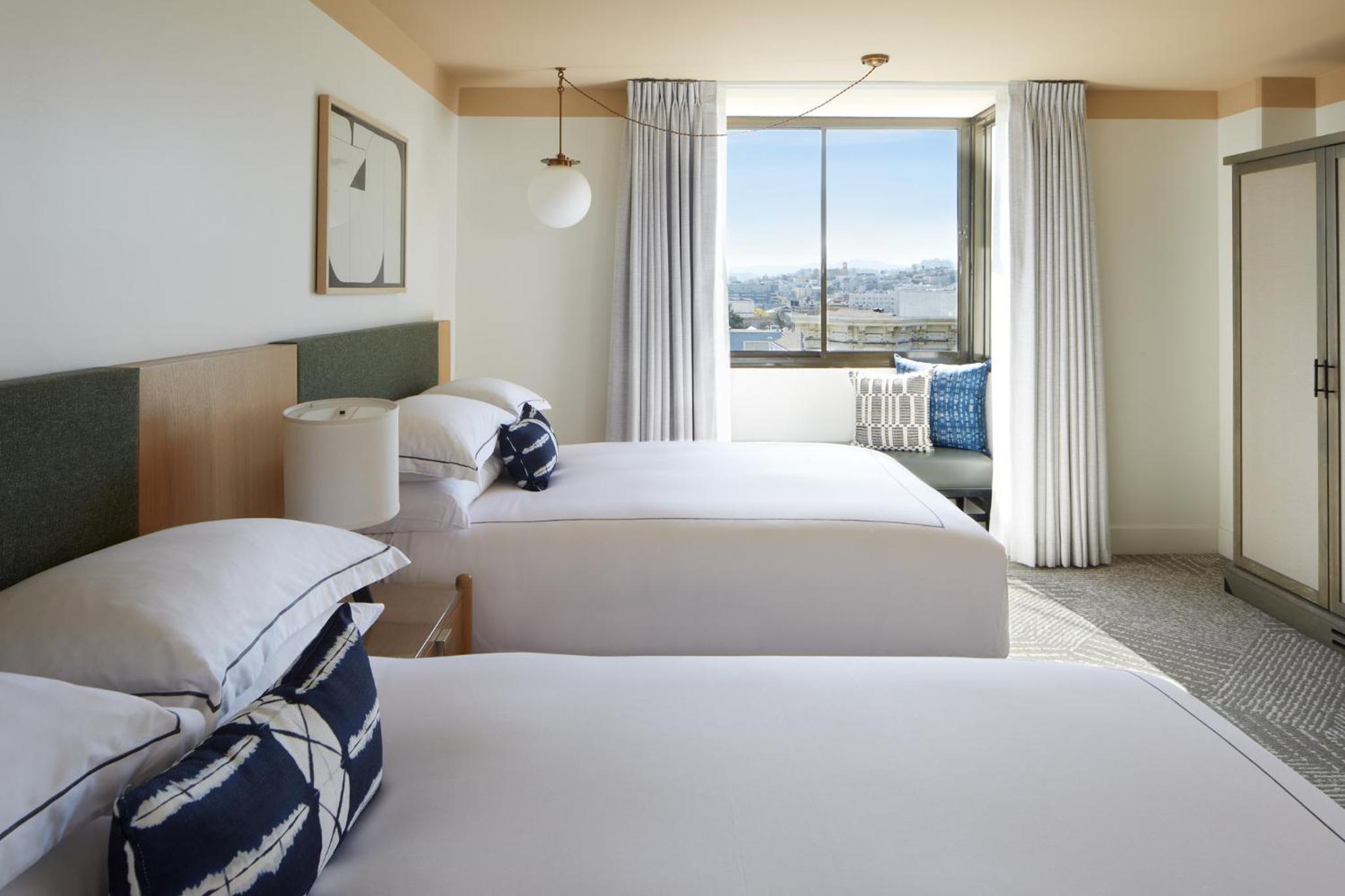 Essential Queen Room with Two Queen Beds and City View - Photo 4