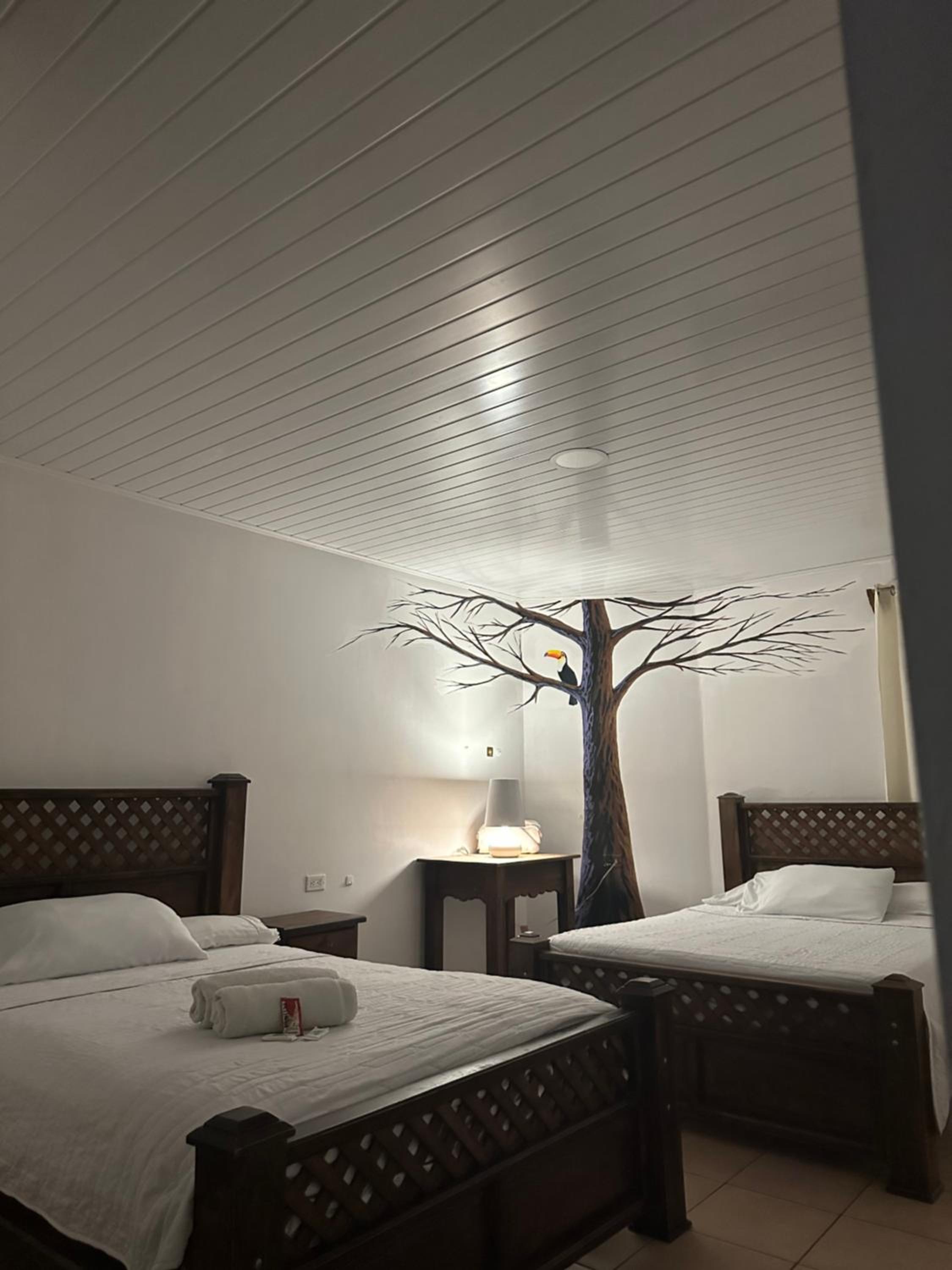 Deluxe Queen Room With Two Queen Beds photo 2