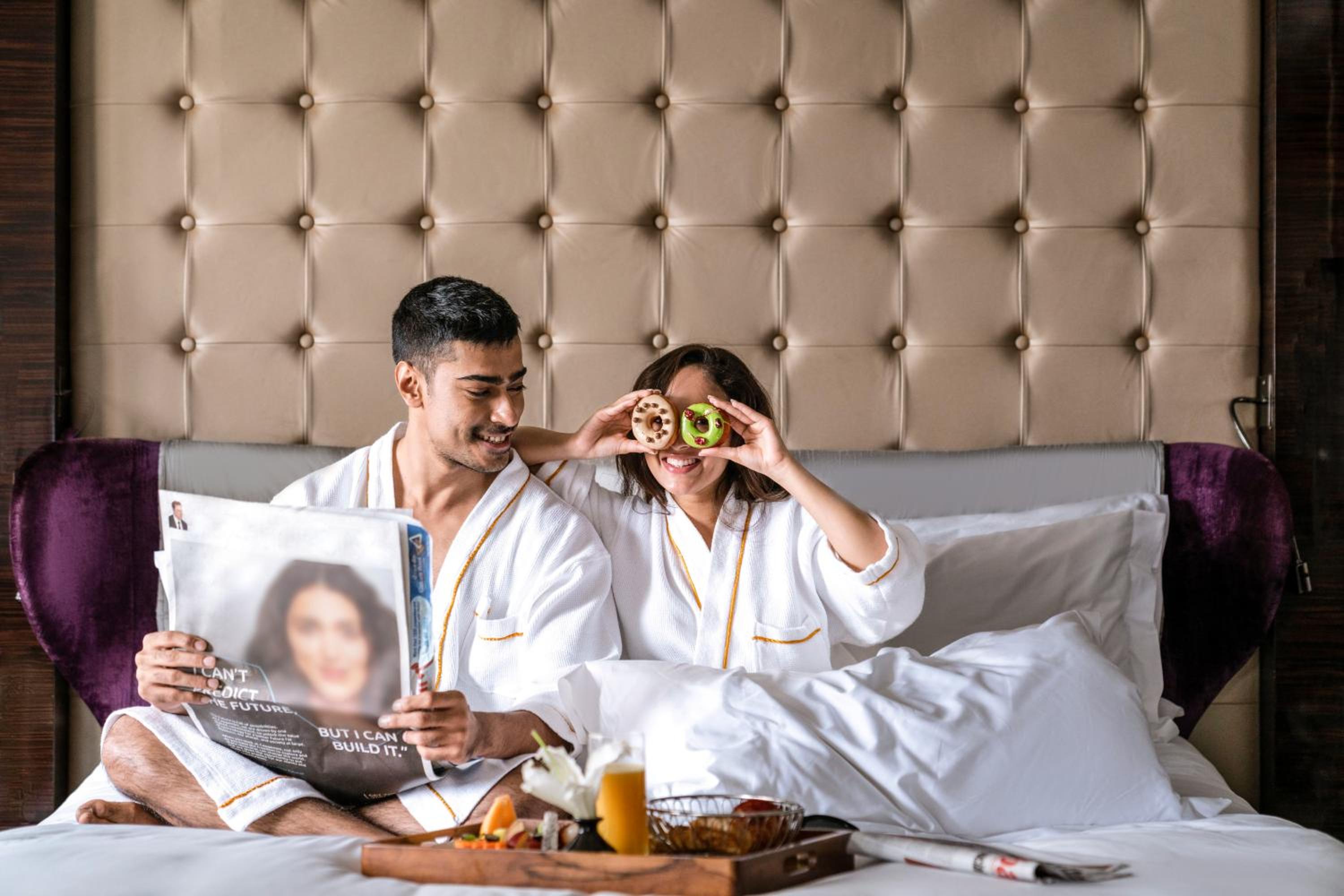 Opera Suite, King Bed, Living Area with Lounge Access, Breakfast, Hi-tea, Cocktail Hours, Meeting Room access for an Hour, Airport Transfers (T1 & T2)