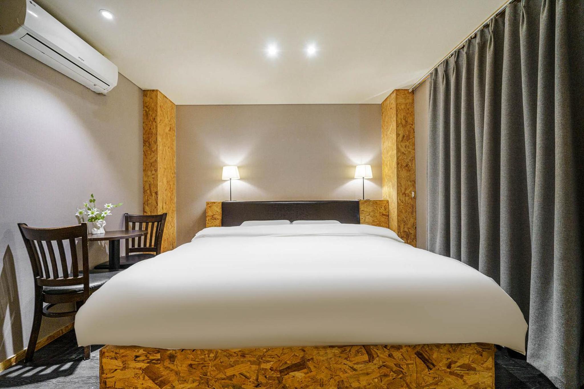 Deluxe Triple Room - Photo 8