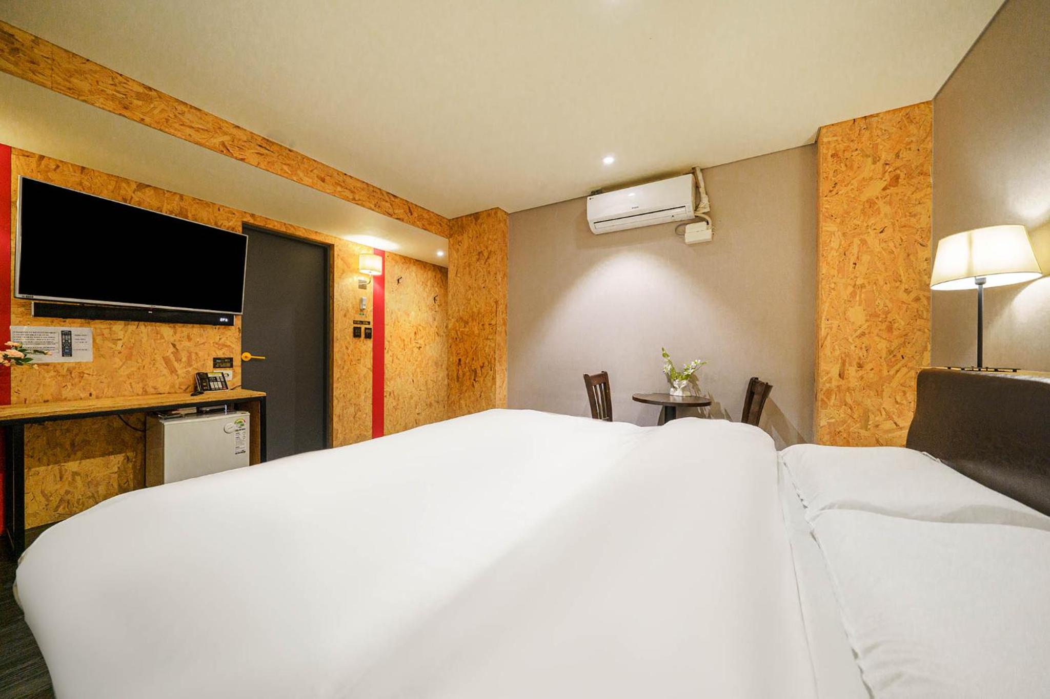 Deluxe Triple Room - Photo 7