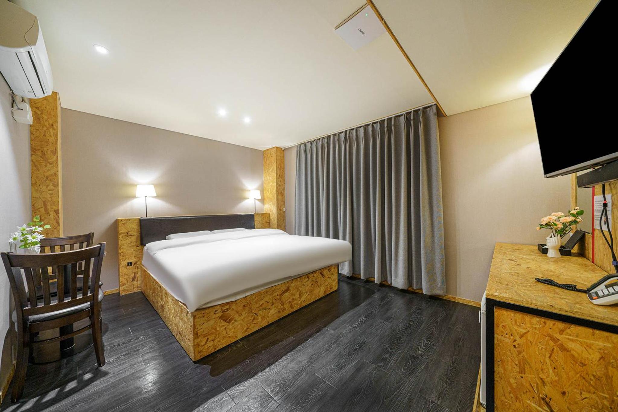 Deluxe Triple Room - Photo 1