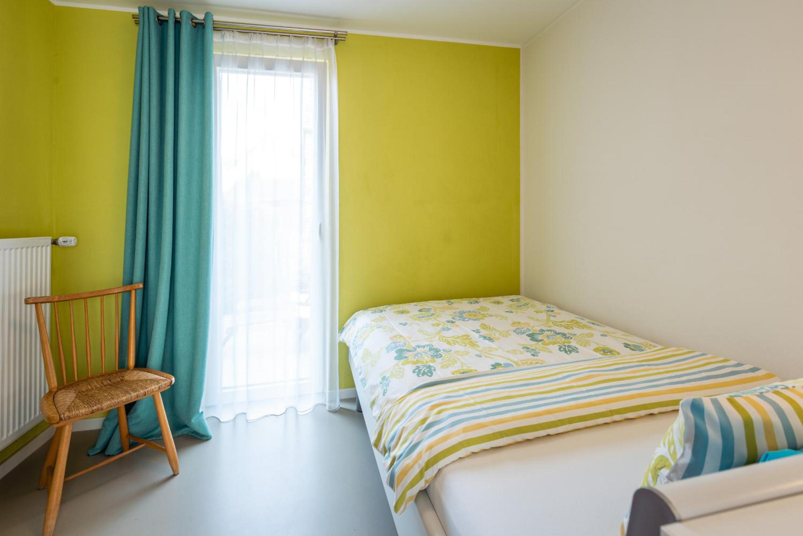 Three-Bedroom Apartment - Photo 10