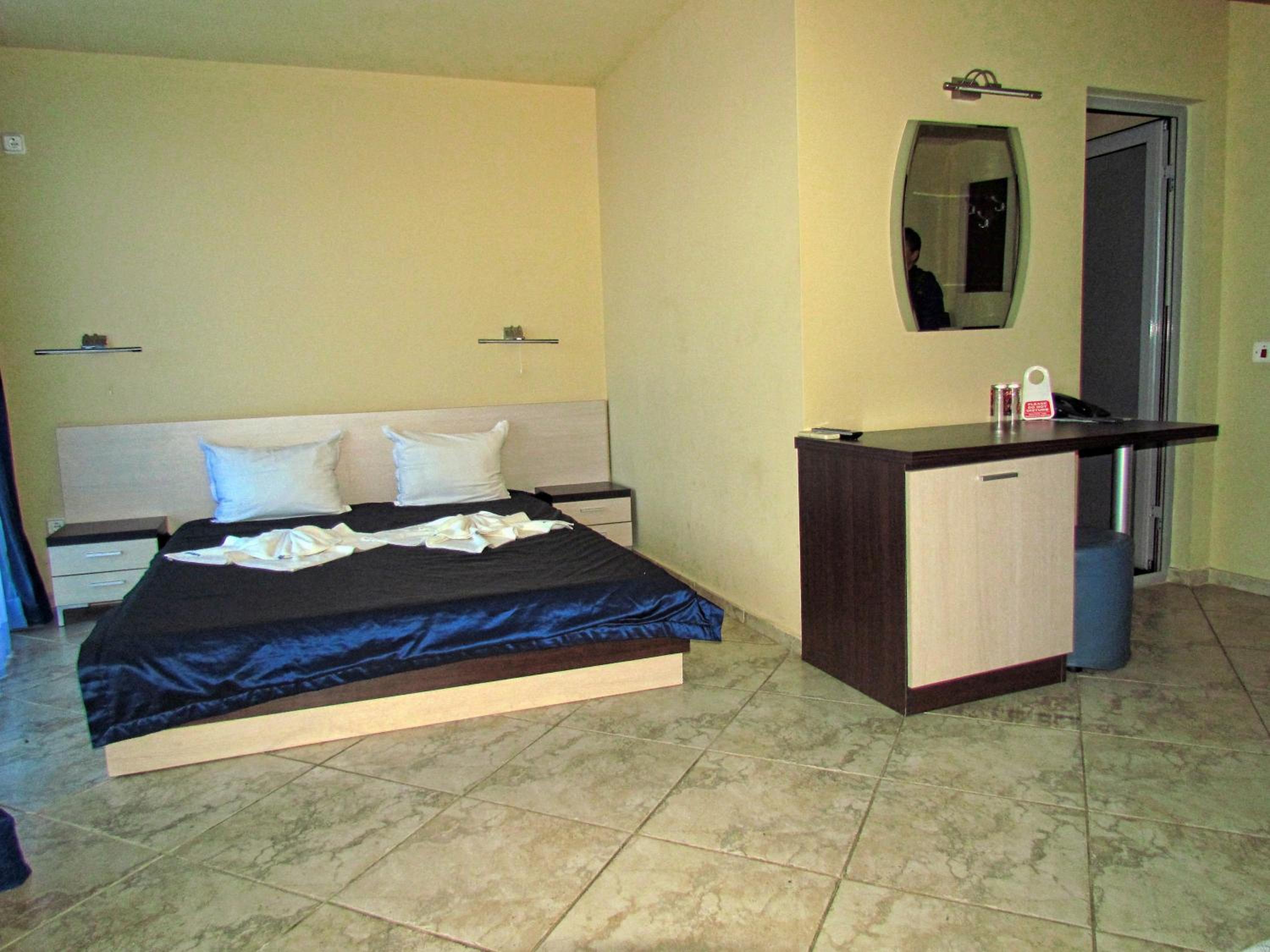Family Room (2 Adults + 2 Children) with Sea View photo 1