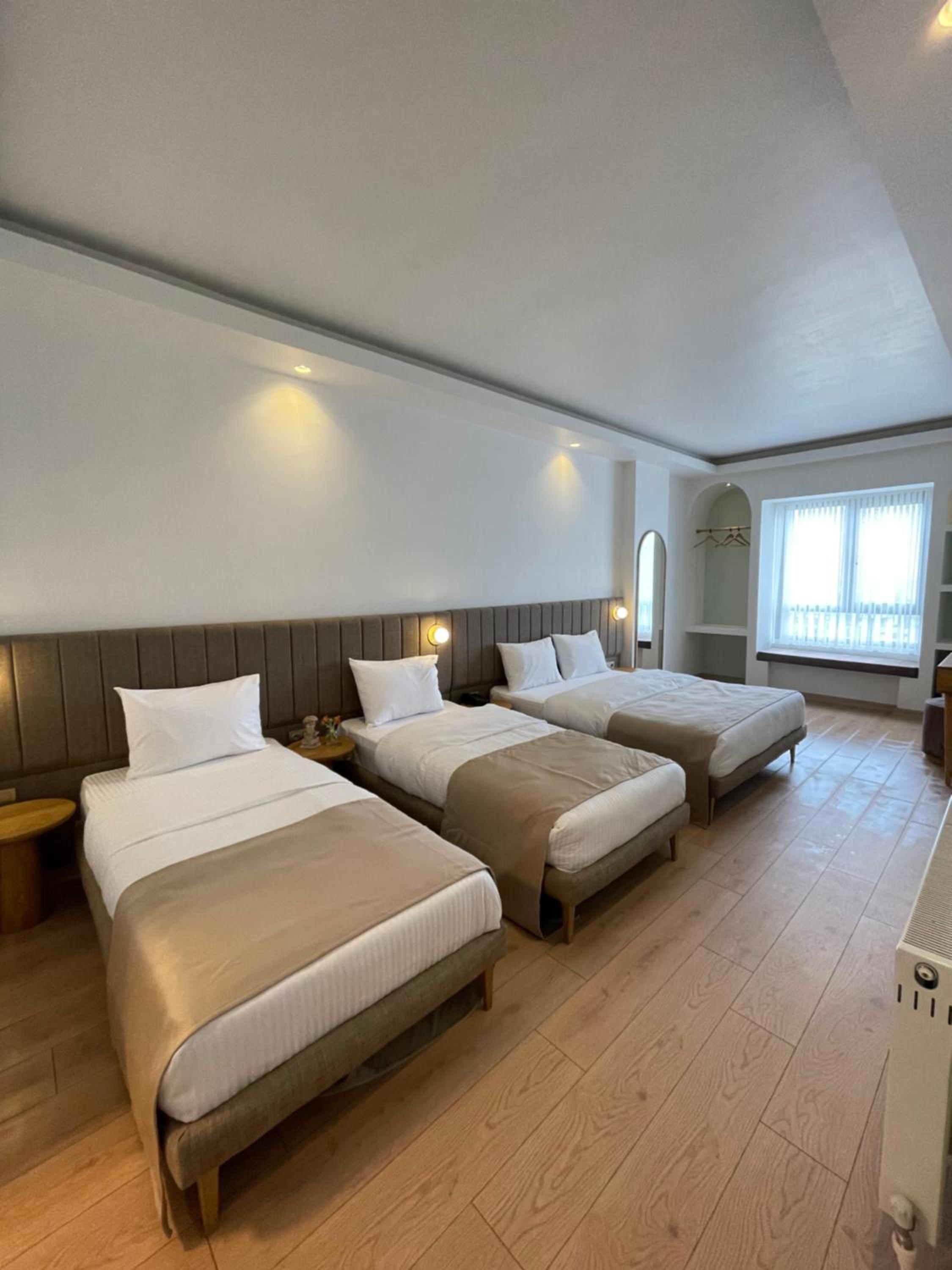 Deluxe Quadruple Room - Photo 17
