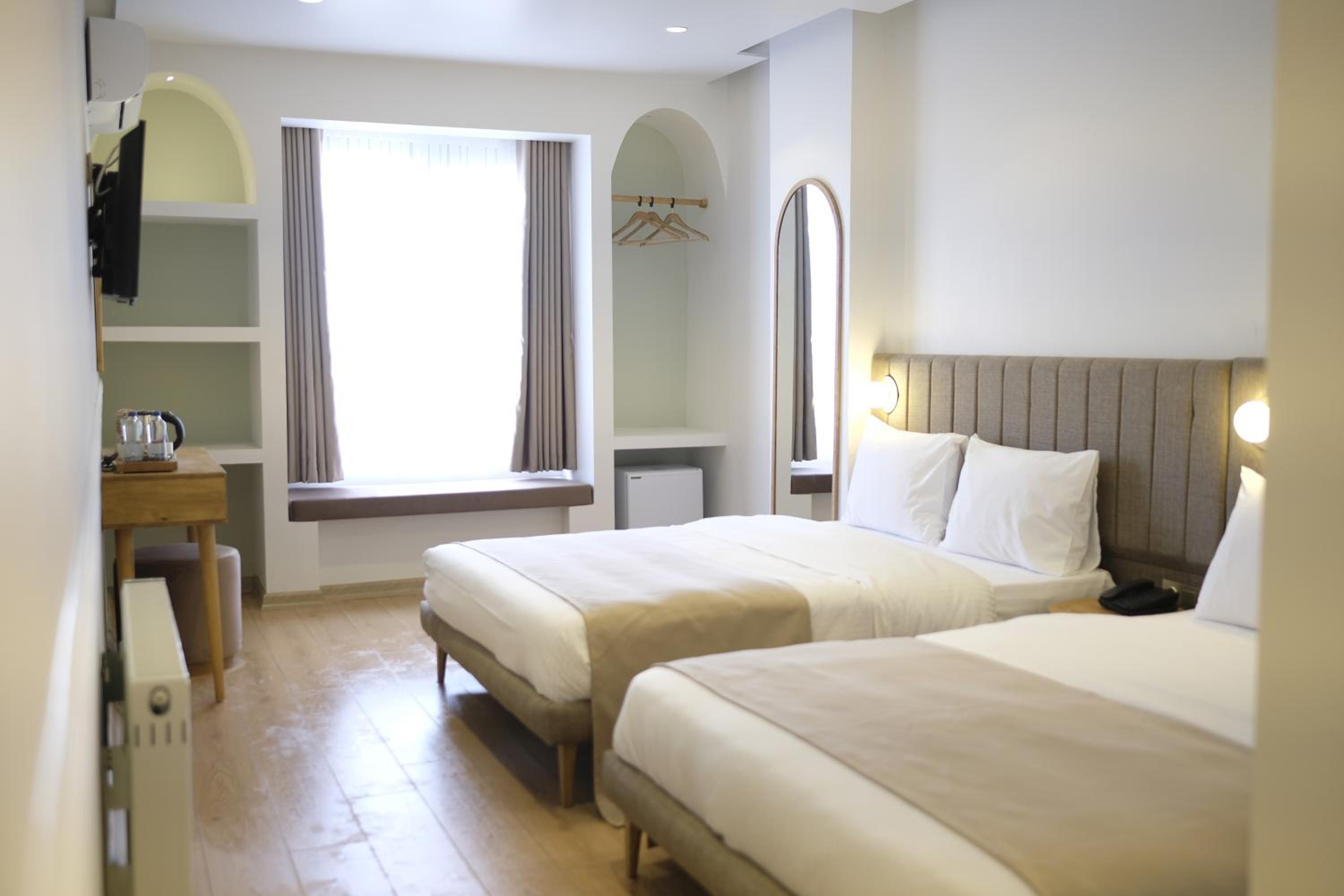 Deluxe Triple Room - Photo 20