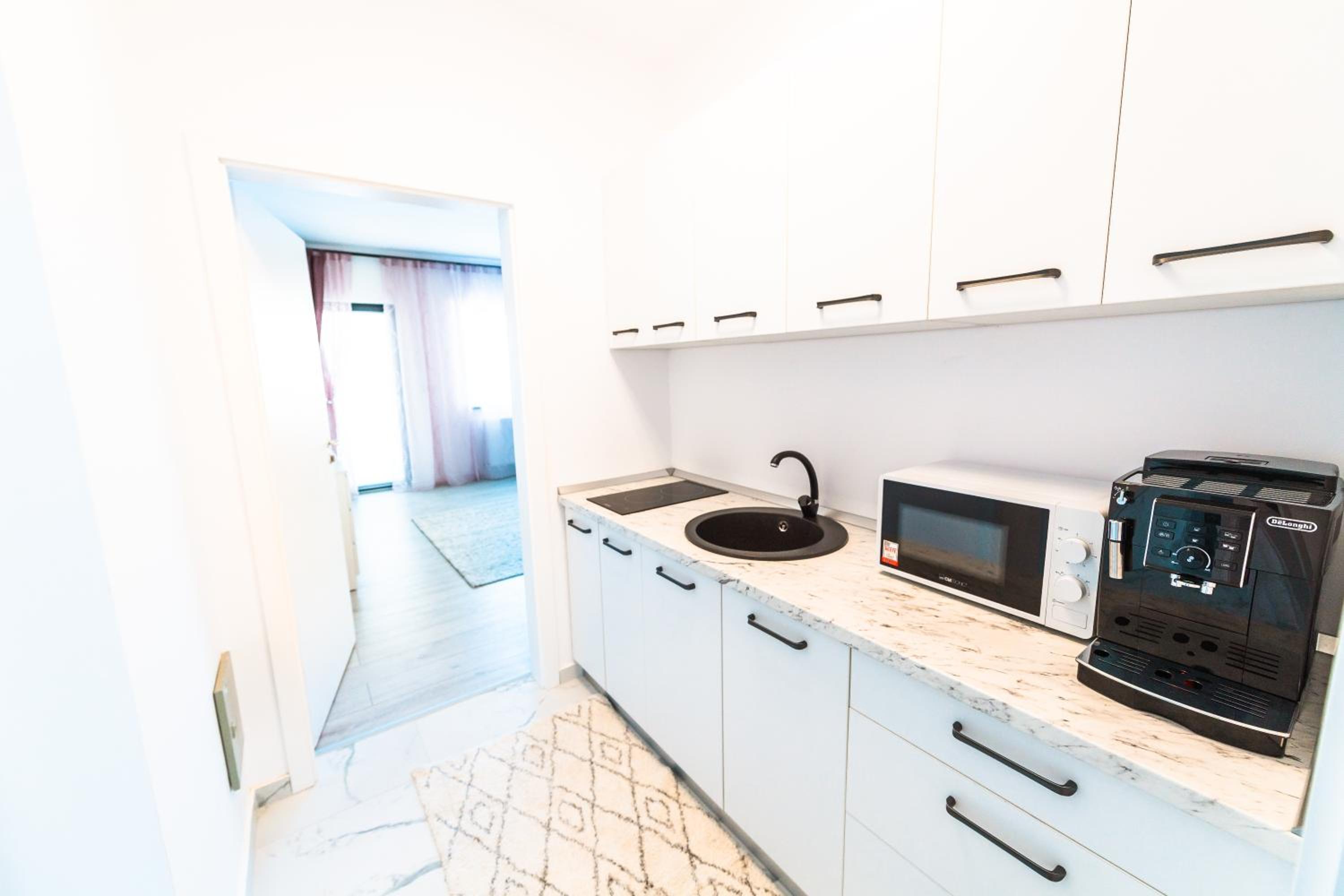 Apartment with Balcony - Photo 24