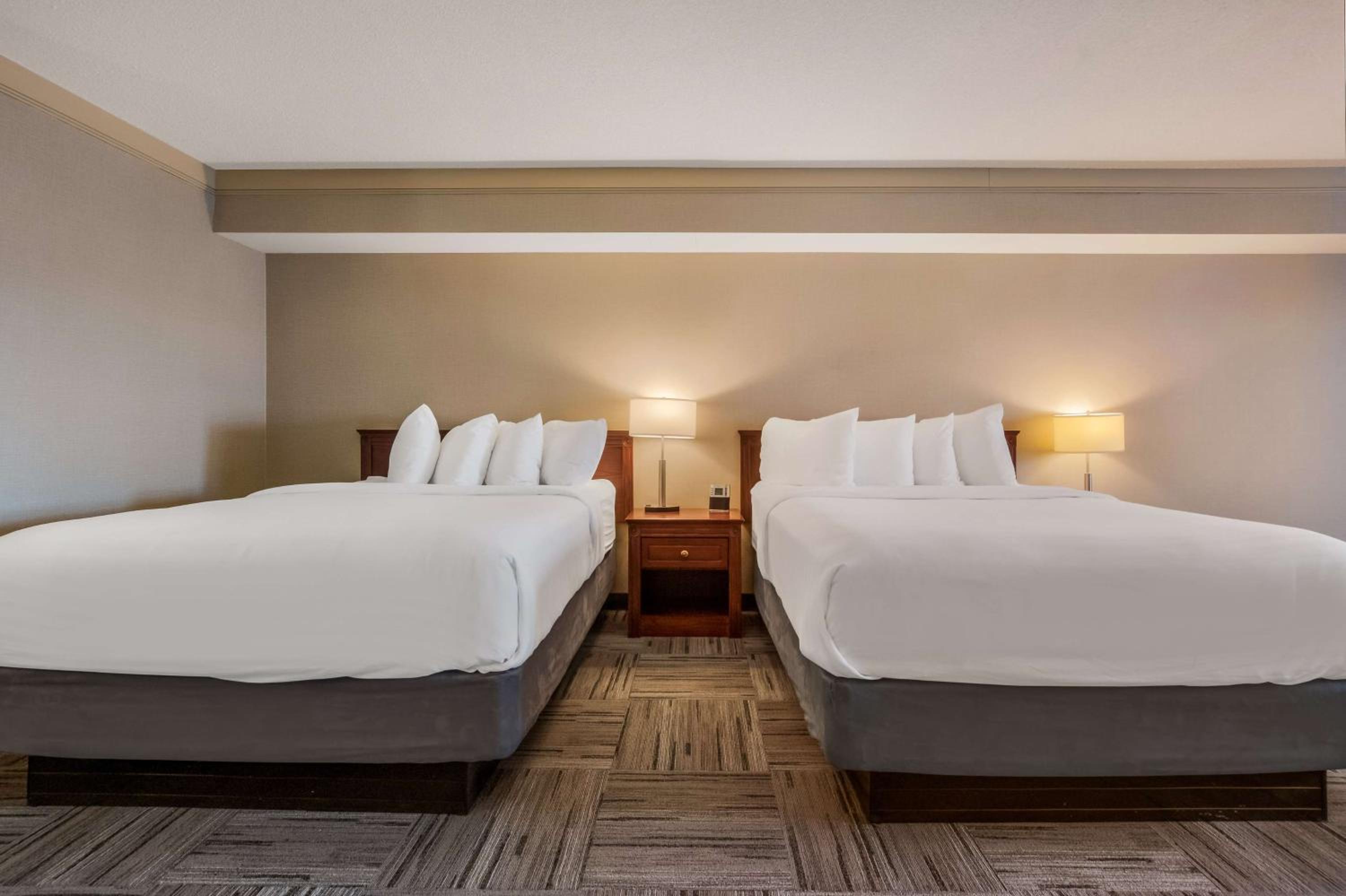 Room with Two Queen Beds and Fireplace - Photo 1