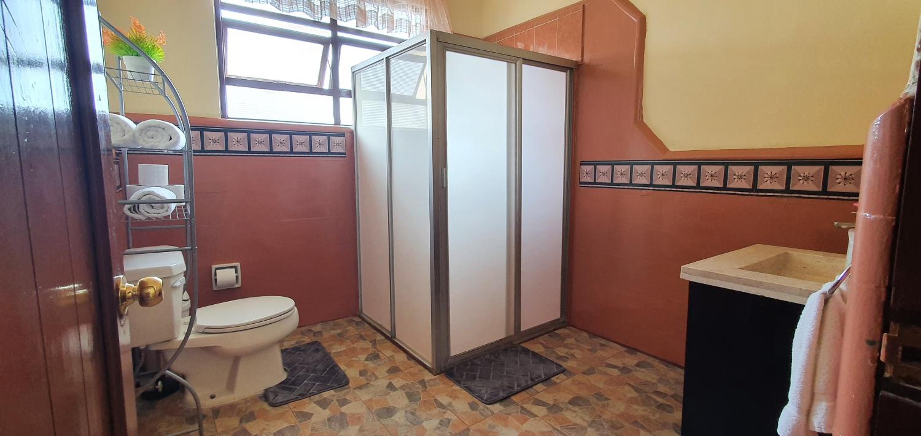 Three-Bedroom Apartment - Photo 2