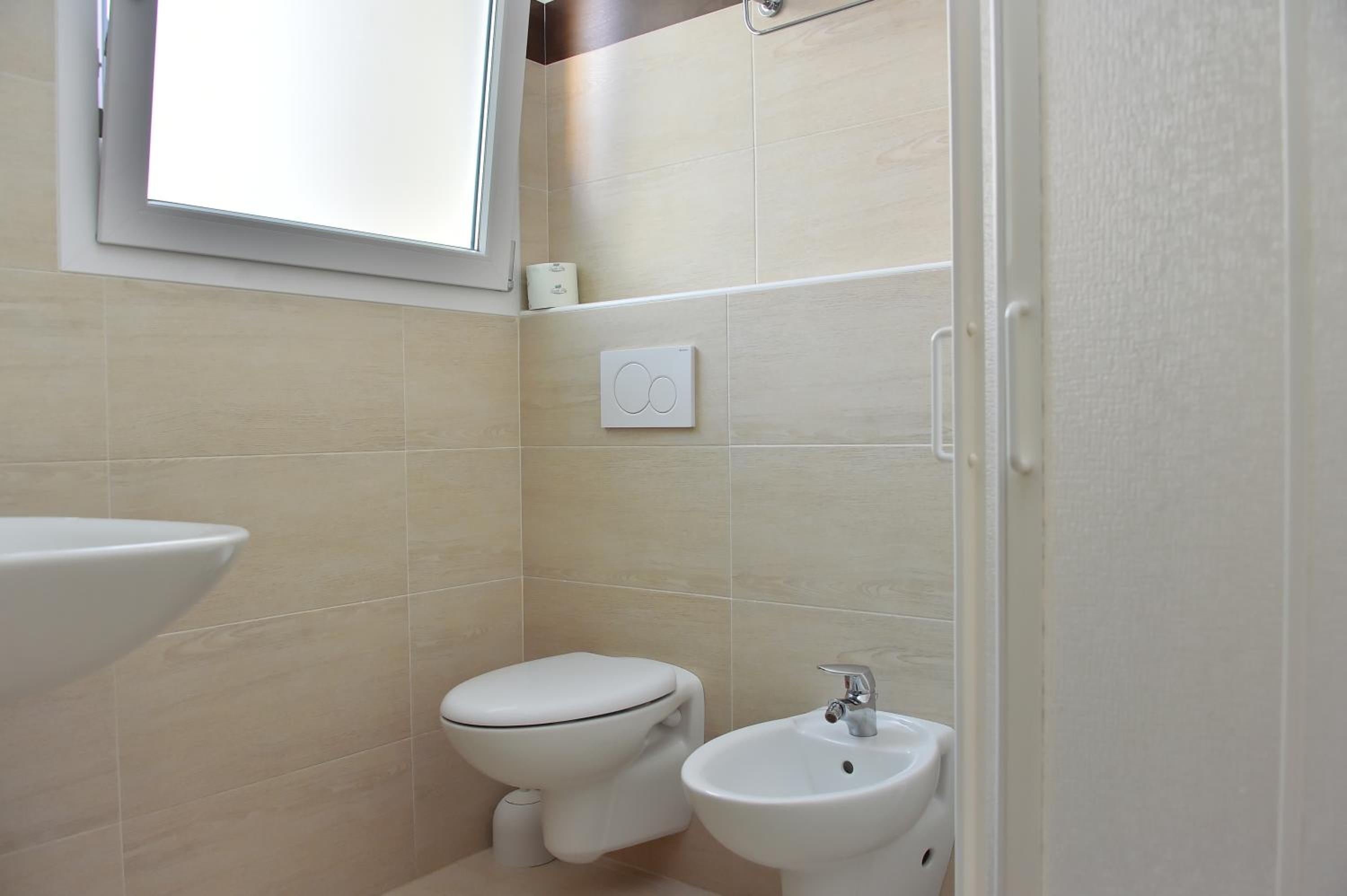 Quadruple Room with Balcony photo 3