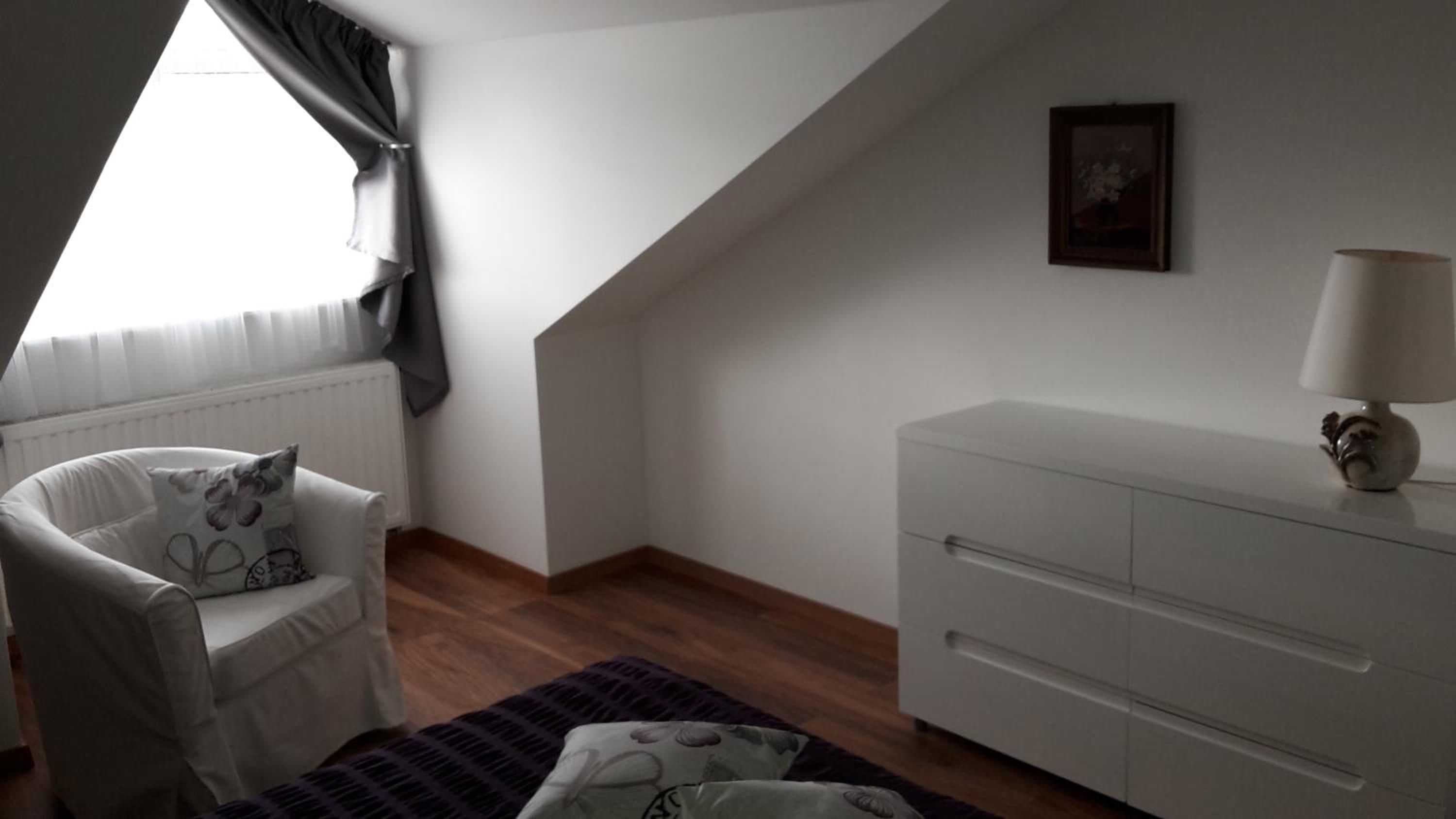 Three-Bedroom Apartment - Photo 11