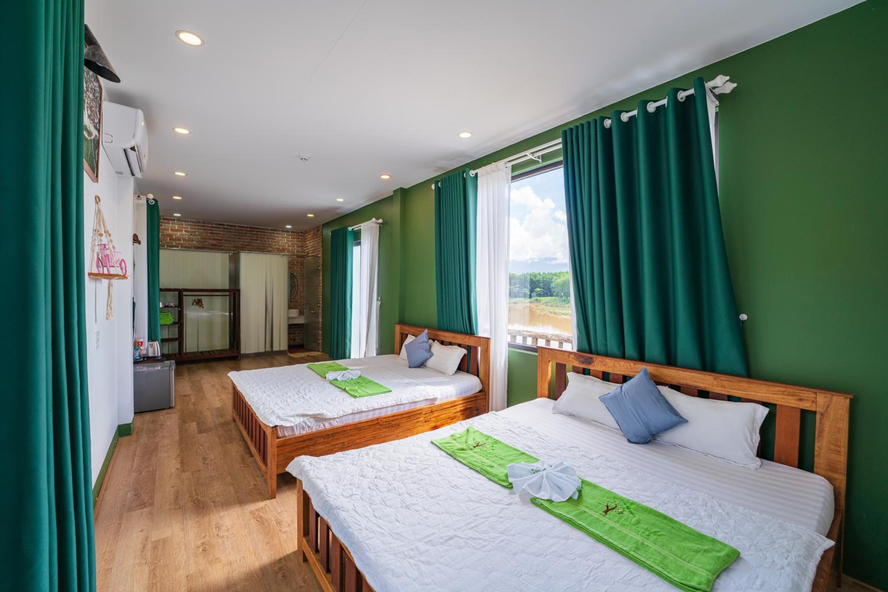 Quadruple Room with Garden View - Photo 1