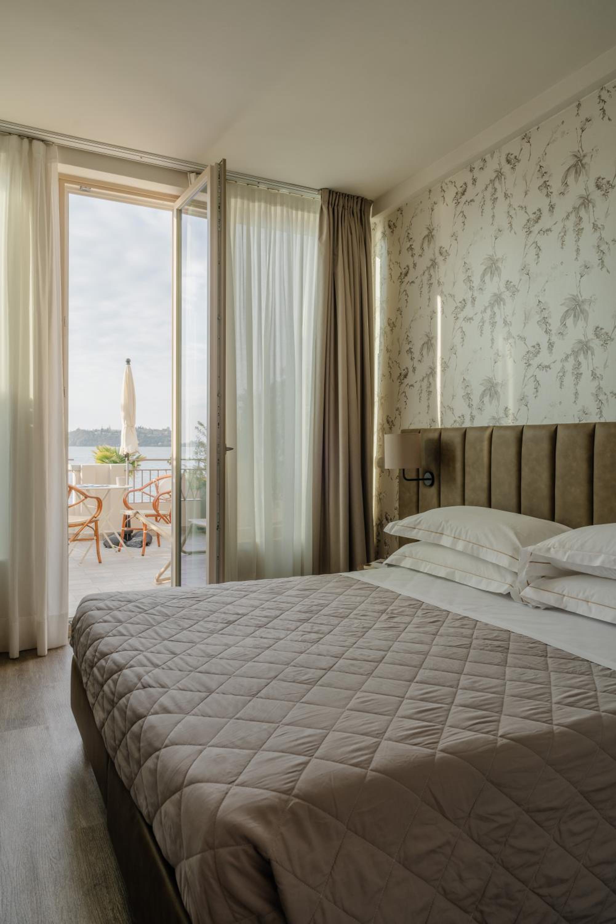 Room with Lake View and Terrace - Photo 1