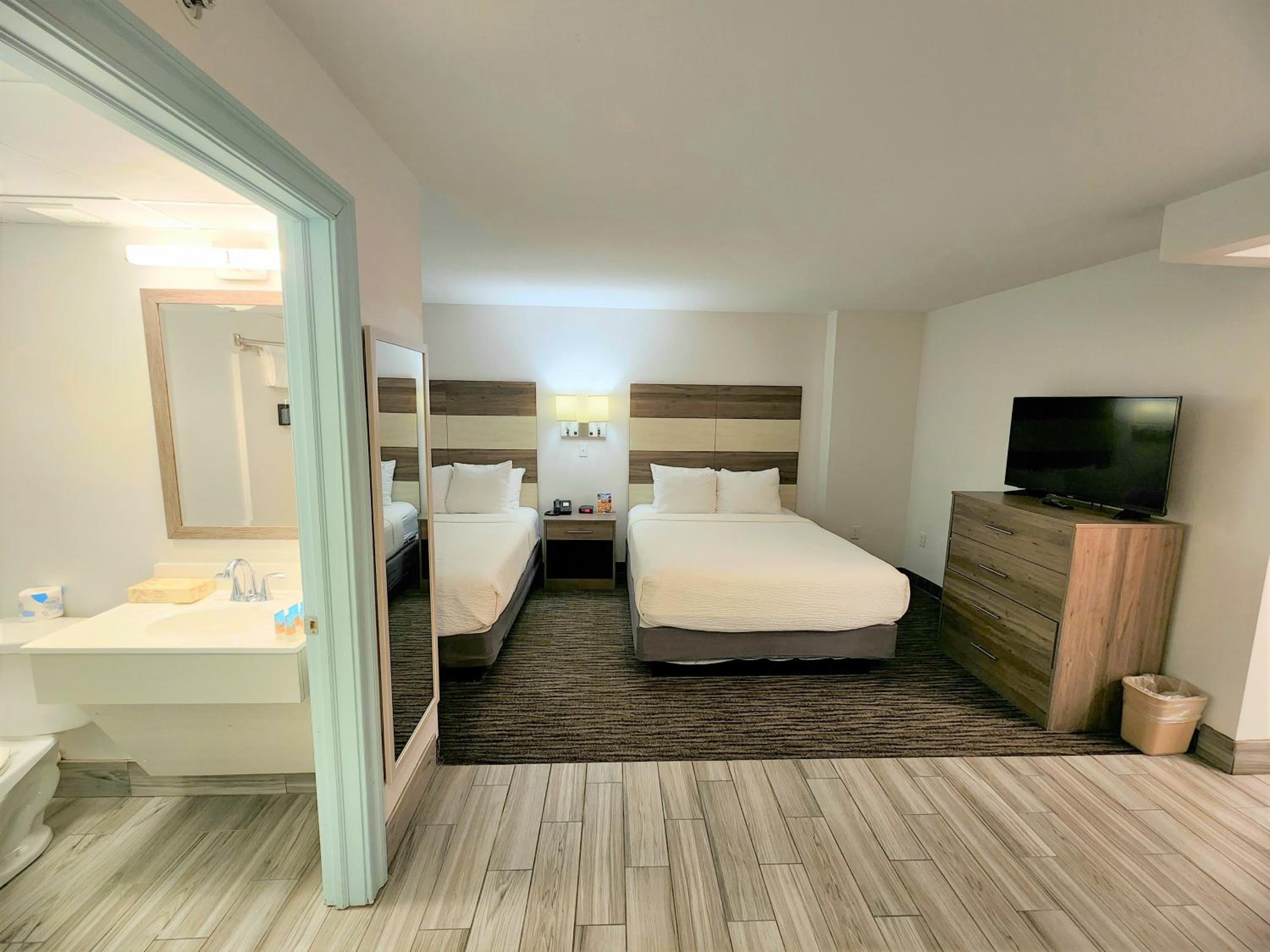 Two Queen Bed Room with Sofa Bed, No Windows or Balcony
