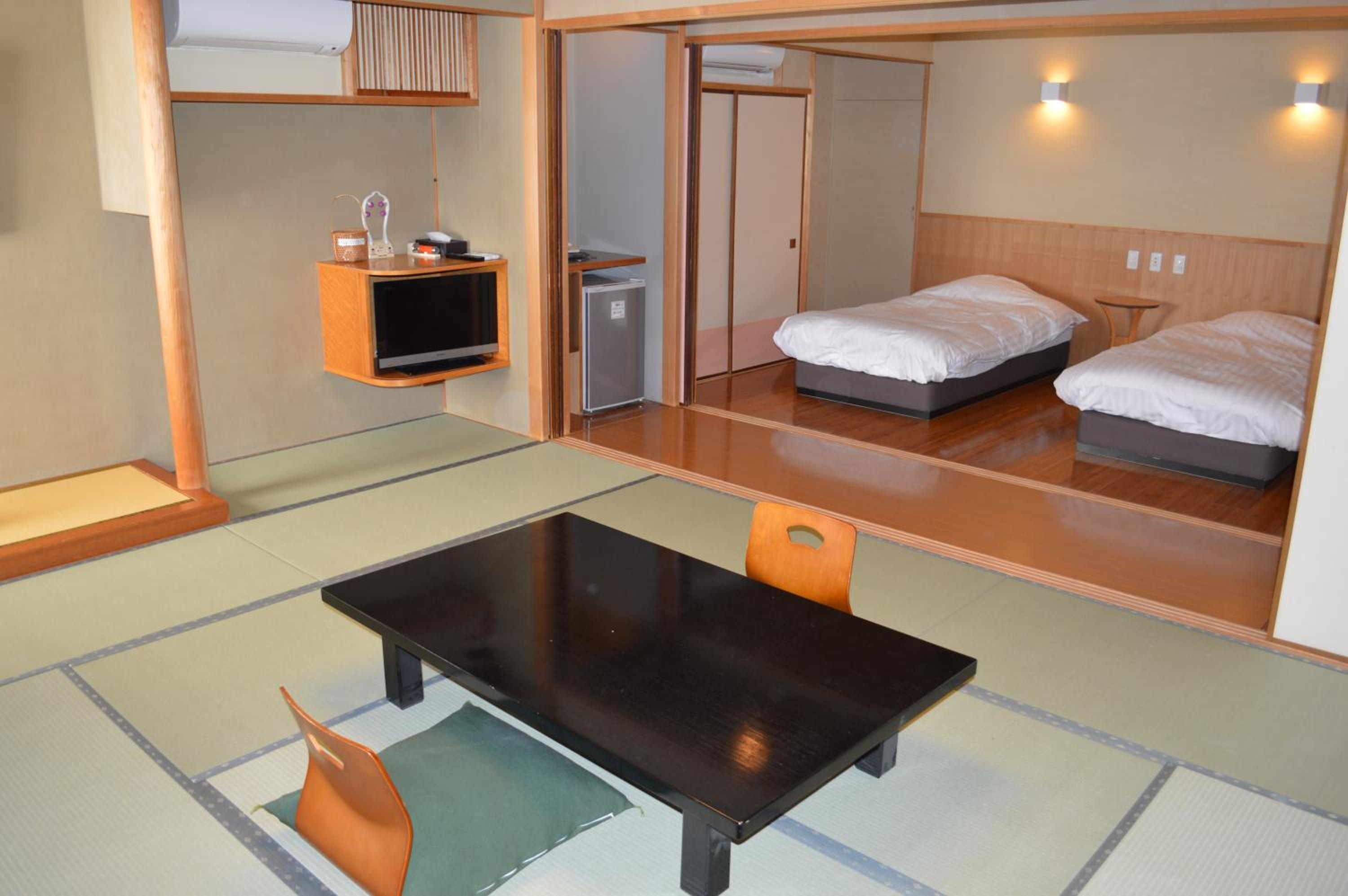 Twin Room with Tatami Area(60sqm) - Upper Floor photo 2
