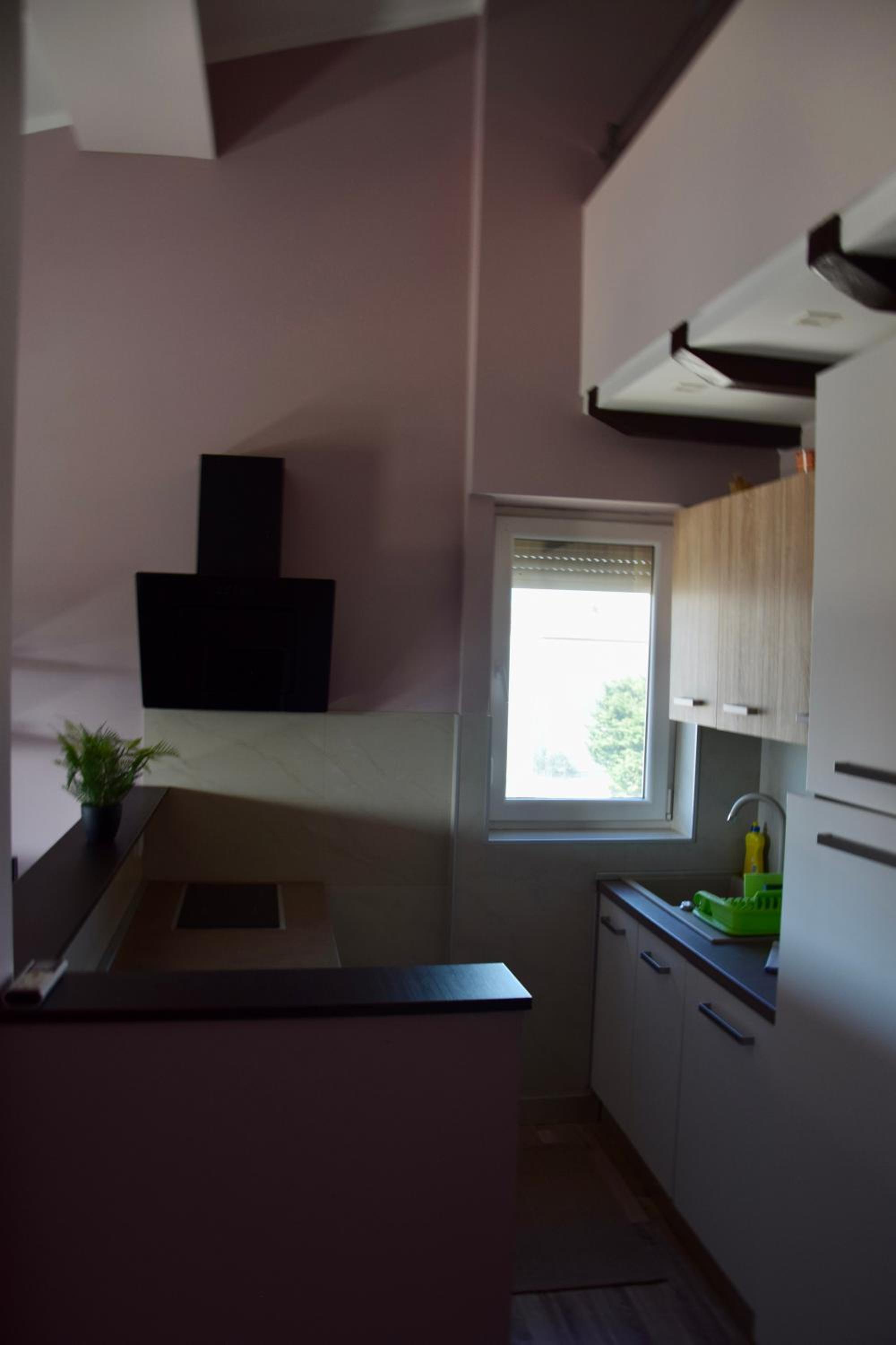 Two-Bedroom Apartment - Photo 42