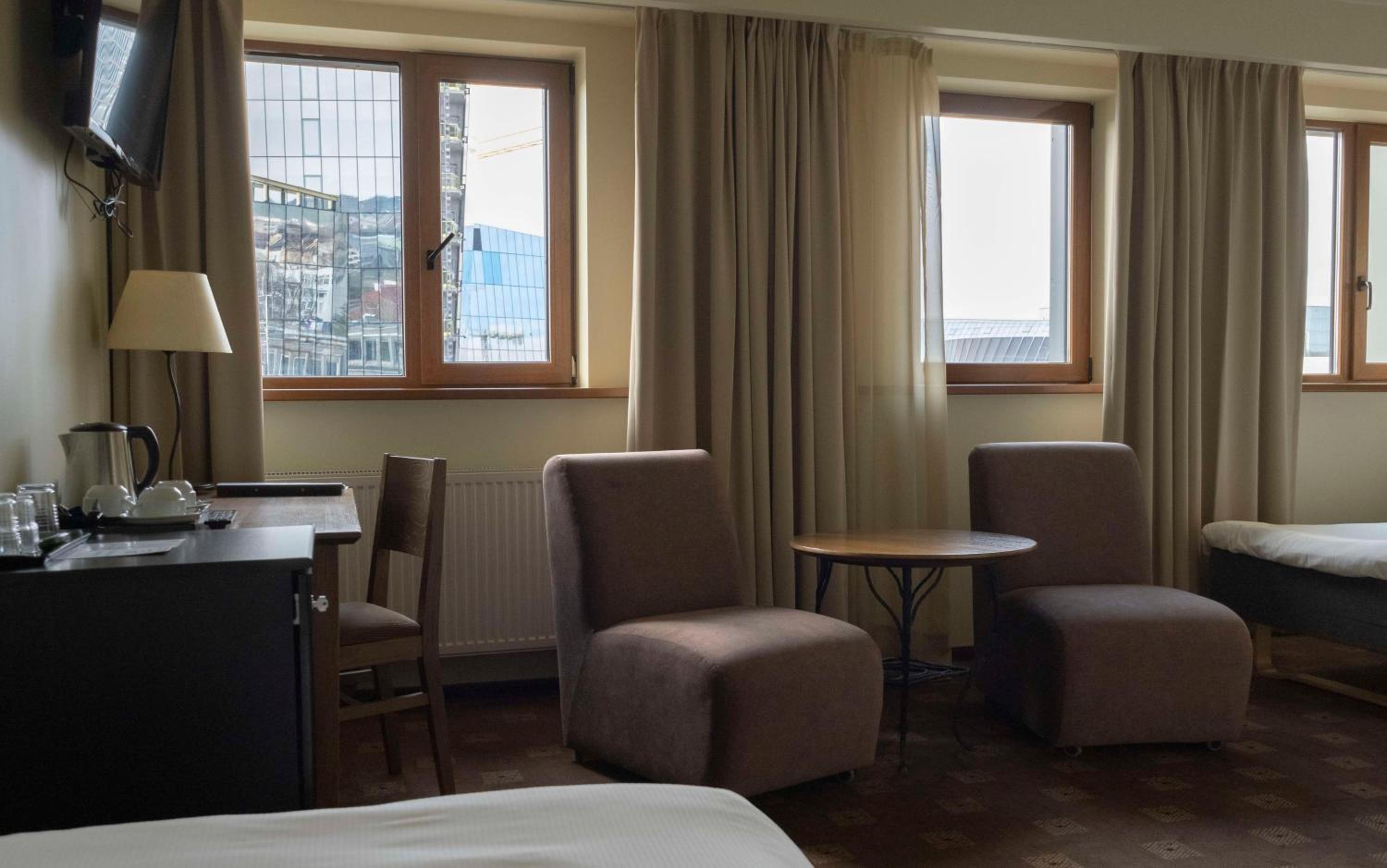 Triple Room with Three Single Beds - Photo 1
