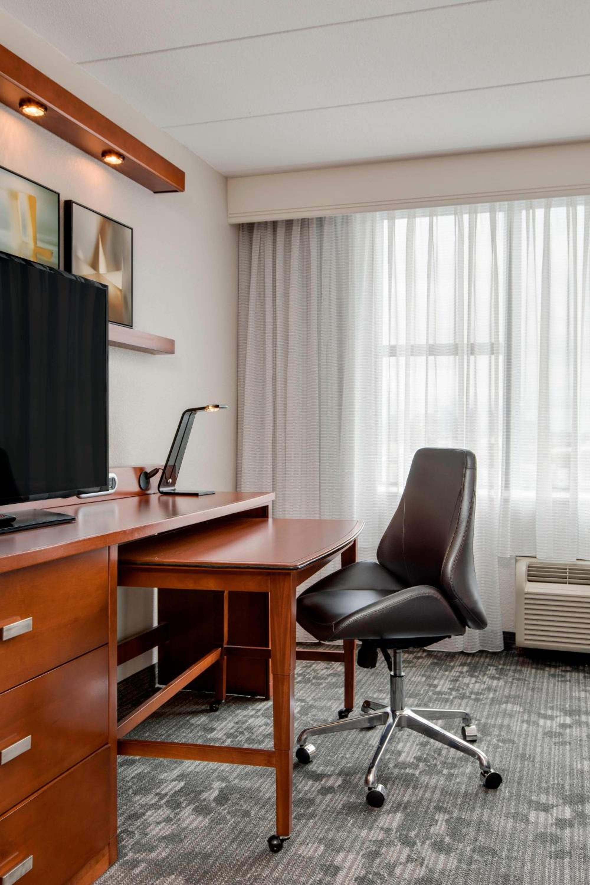 King Room with Sofa Bed and Roll-in Shower - Mobility and Hearing Accessible
