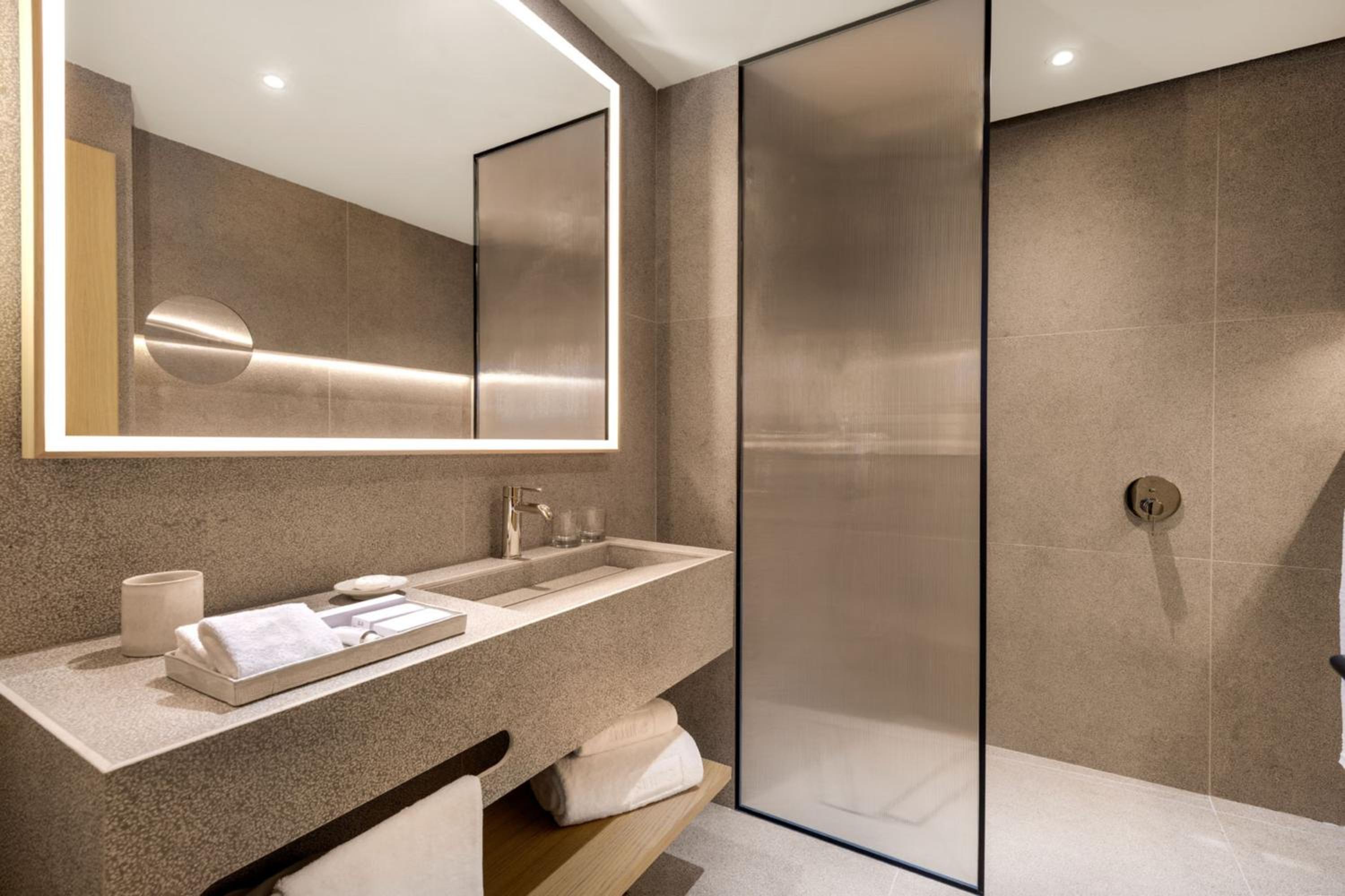 Two-Bedroom Suite with Balcony and Partial Sea View