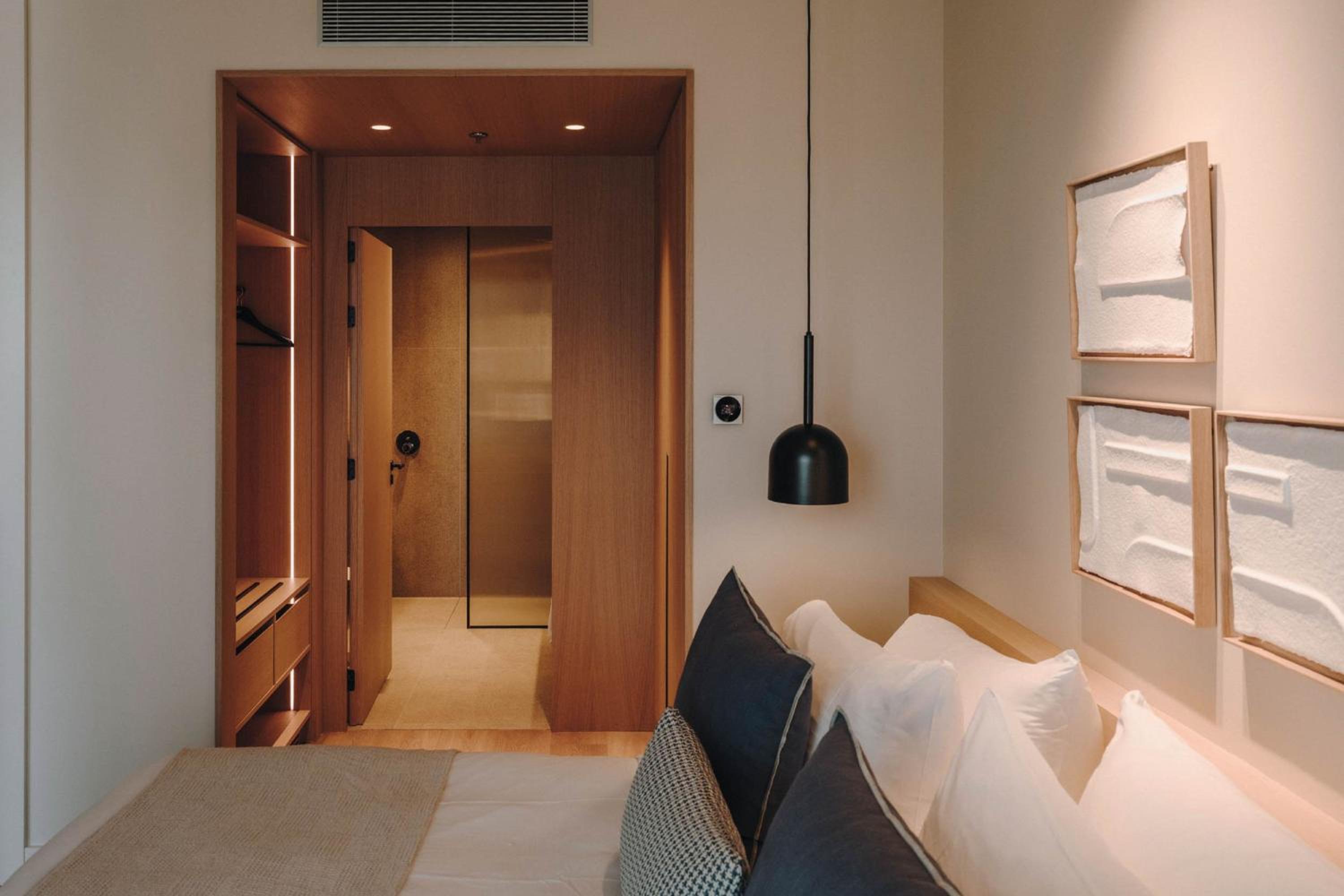 Two-Bedroom Suite with Balcony and Partial Sea View
