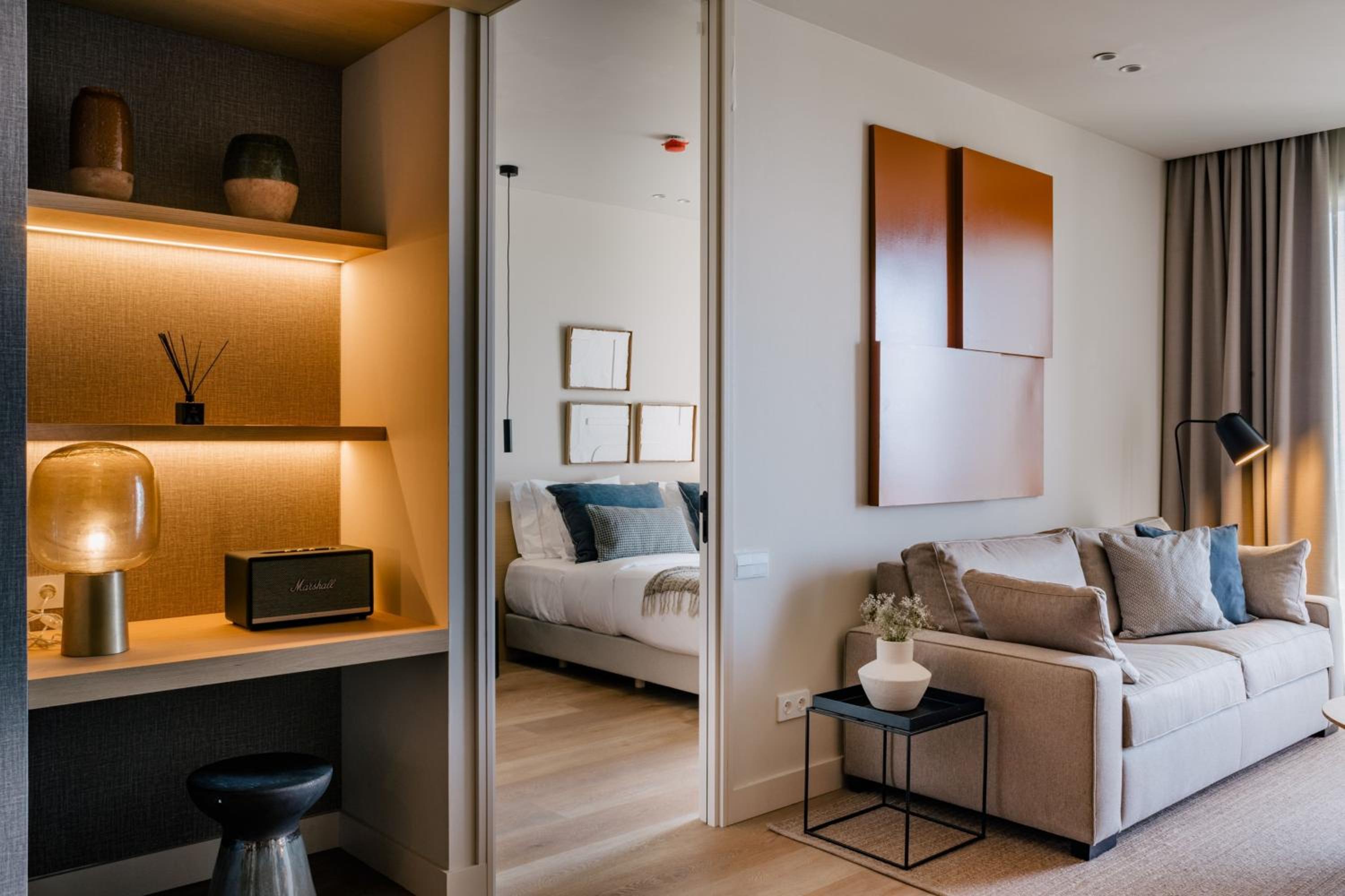 Two-Bedroom Suite with Balcony and Partial Sea View