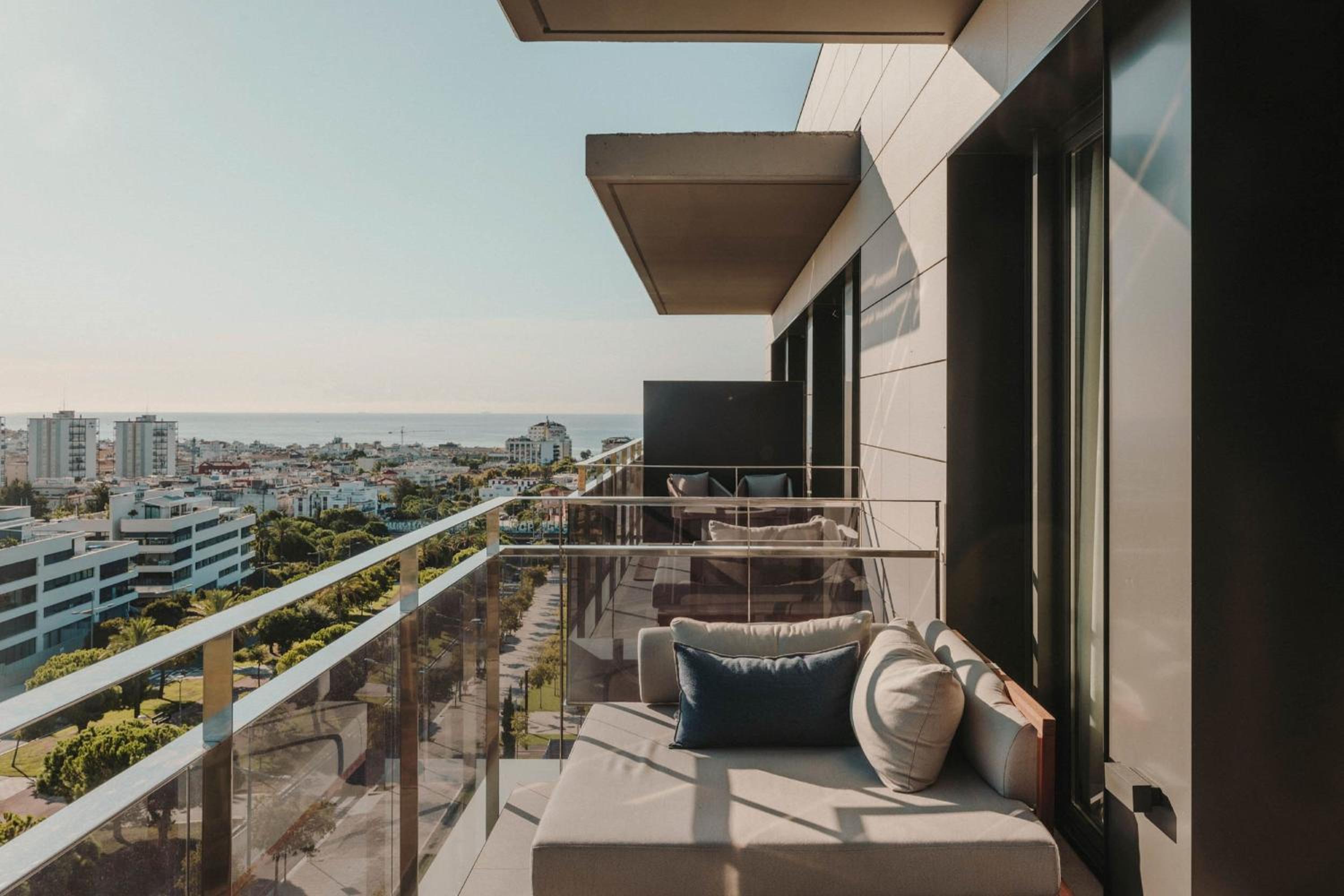 Two-Bedroom Suite with Balcony and Partial Sea View