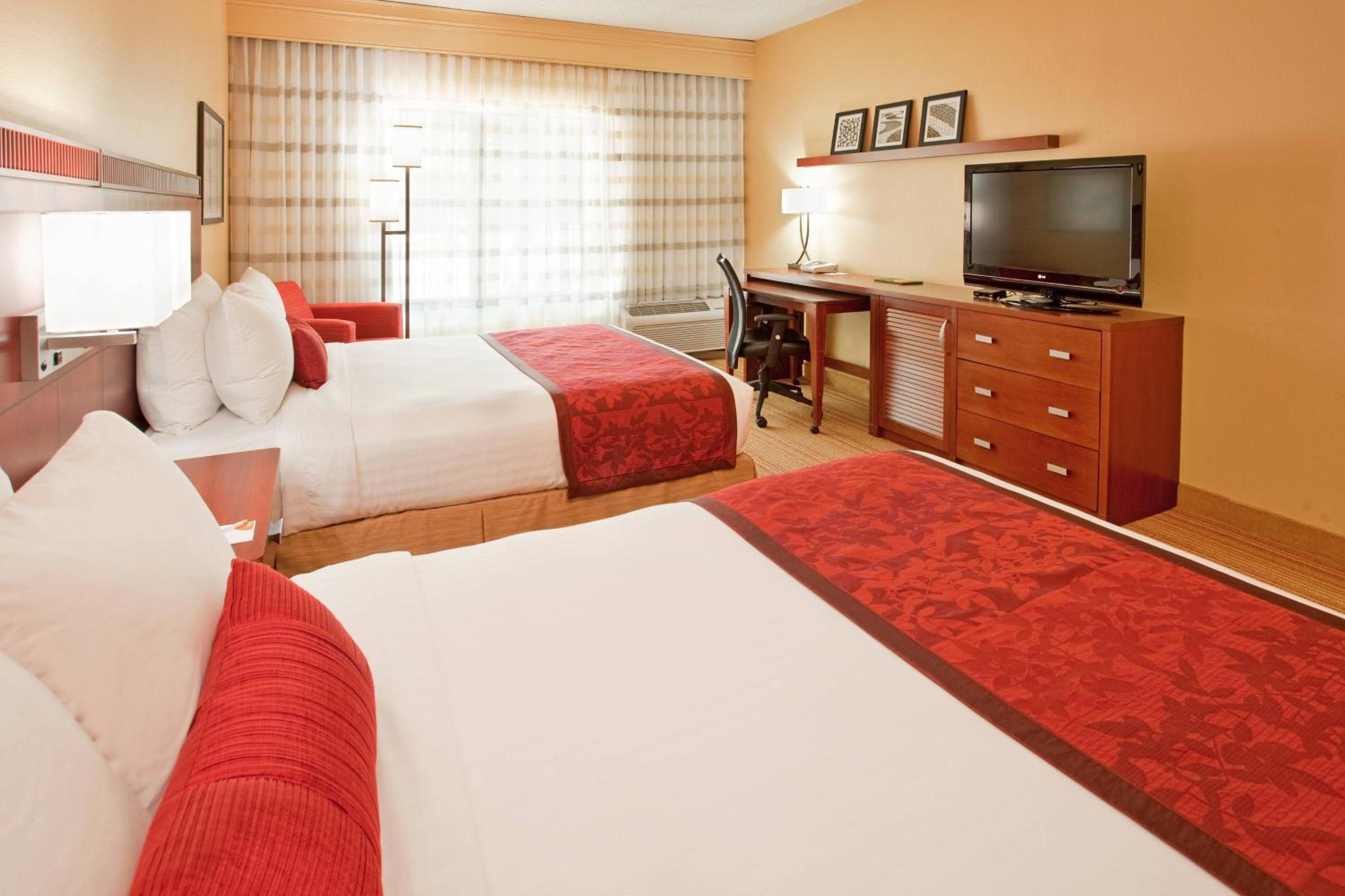 Queen Room with Two Queen Beds - Photo 1