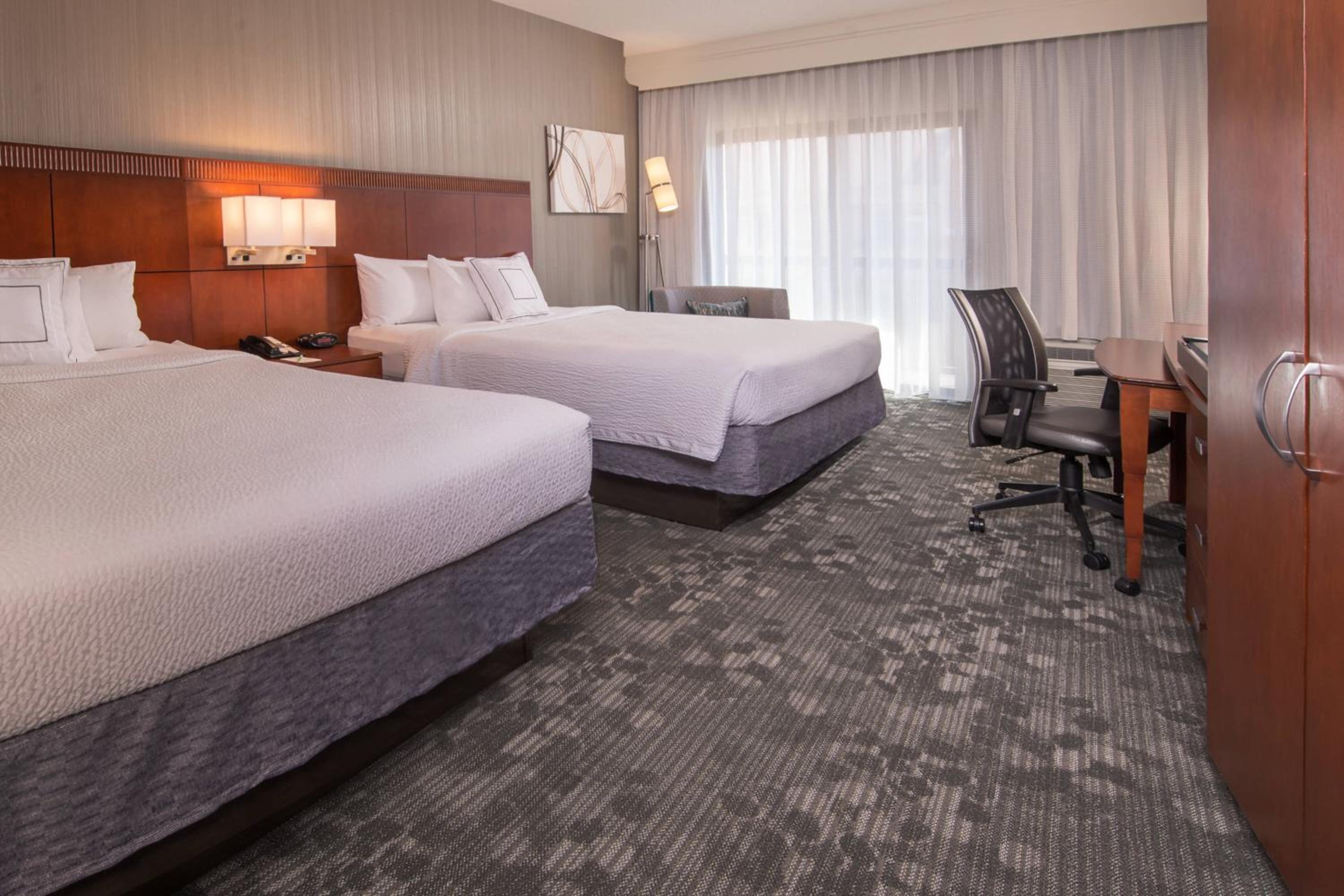 Queen Room with Two Queen Beds - Photo 1