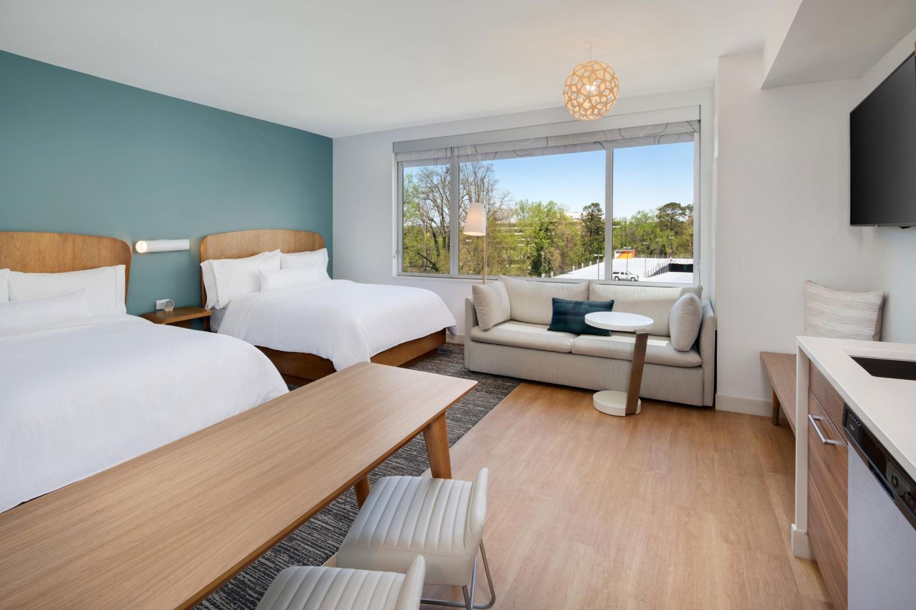 Queen Room with Two Queen Beds and Sofa Bed and View - Photo 1