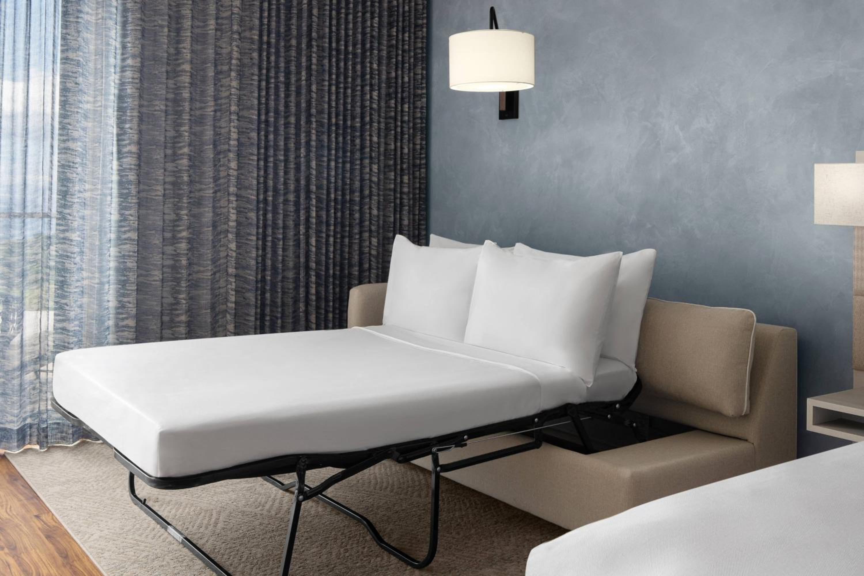 Guest Room with 1 king bed, sofa bed ocean view and balcony
