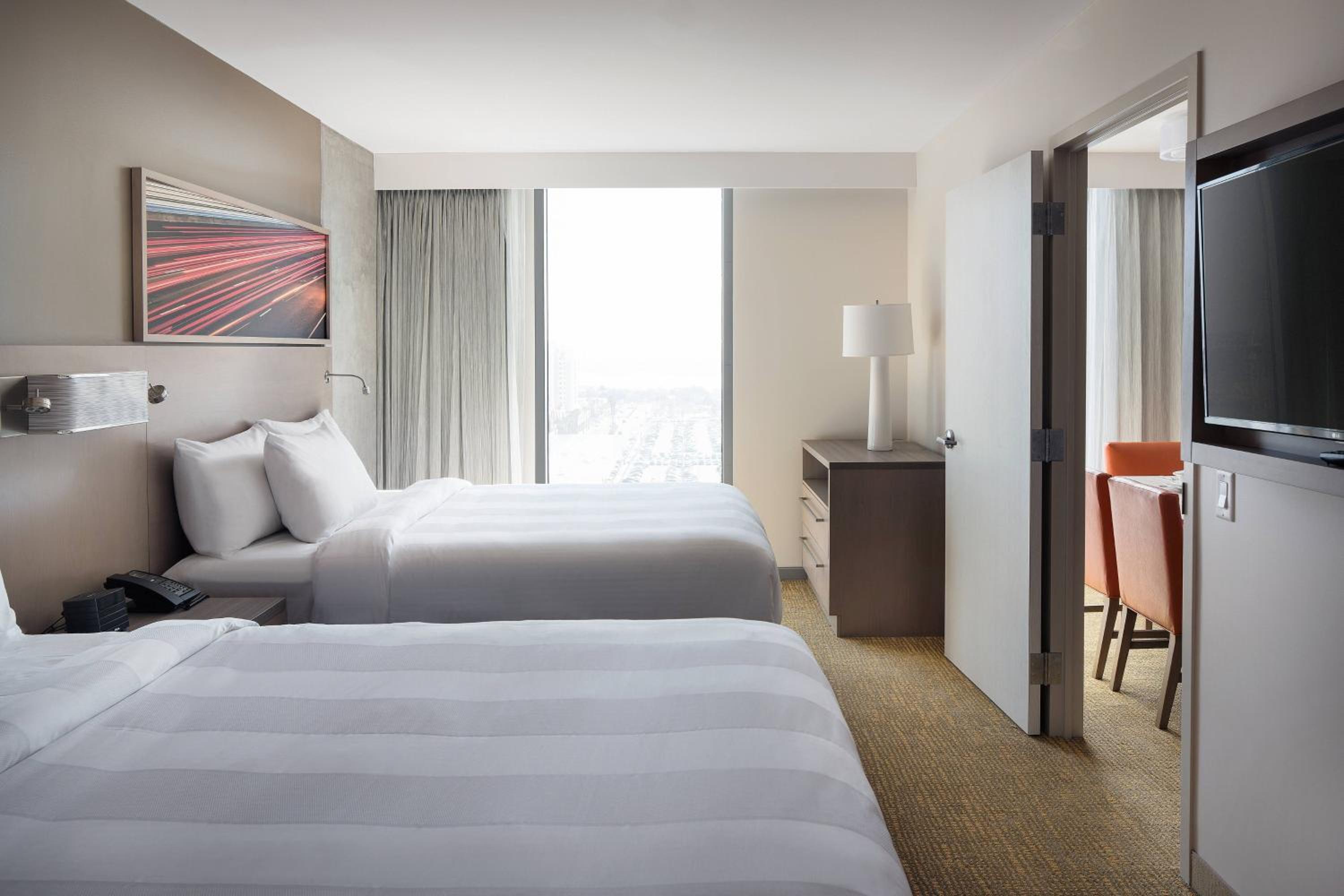 Two-Bedroom King Suite with Two Queen Beds - Mobility/Hearing Accessible with Roll-In Shower