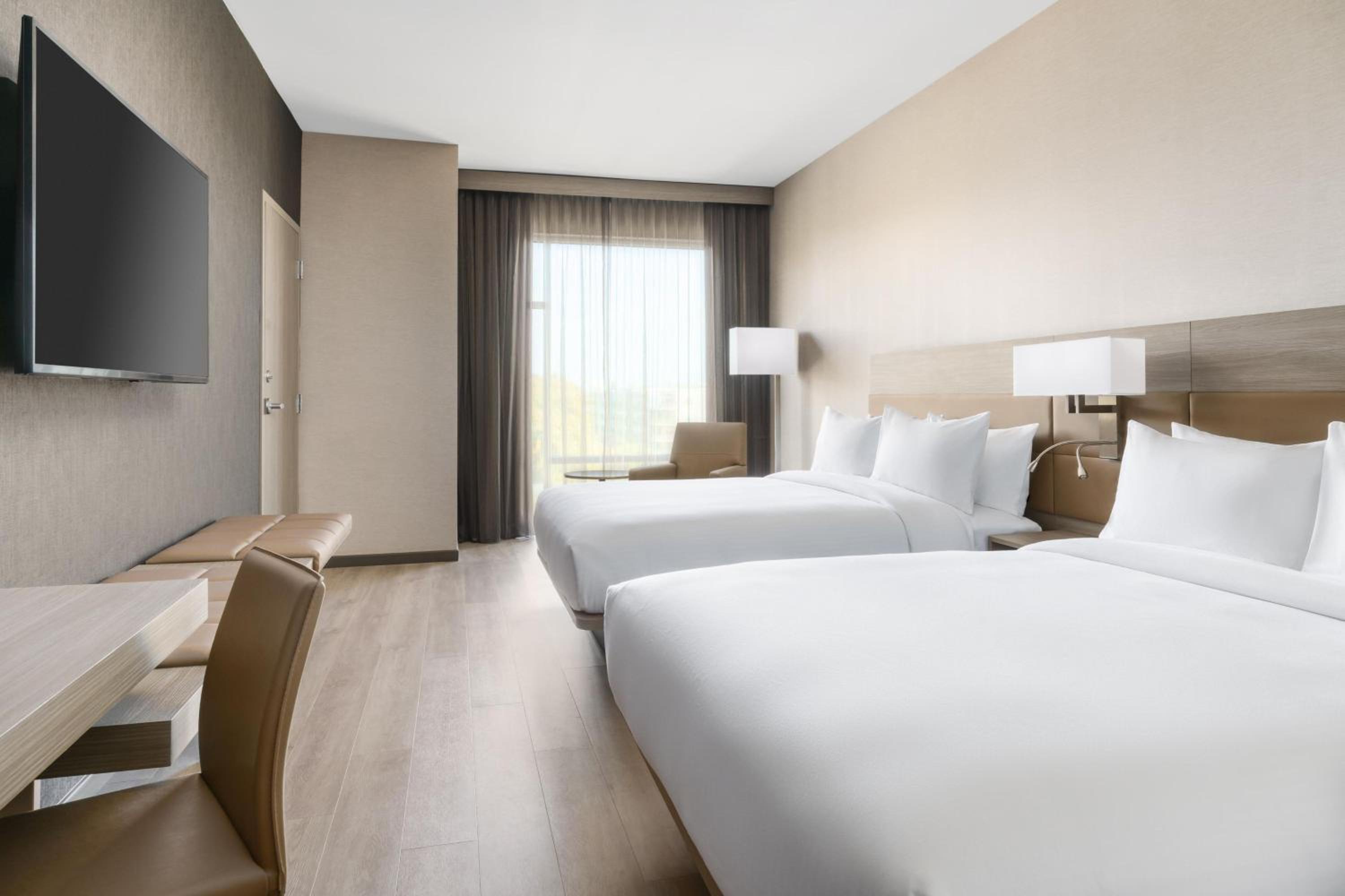 Queen Room with Two Queen Beds - Hearing Accessible photo 1