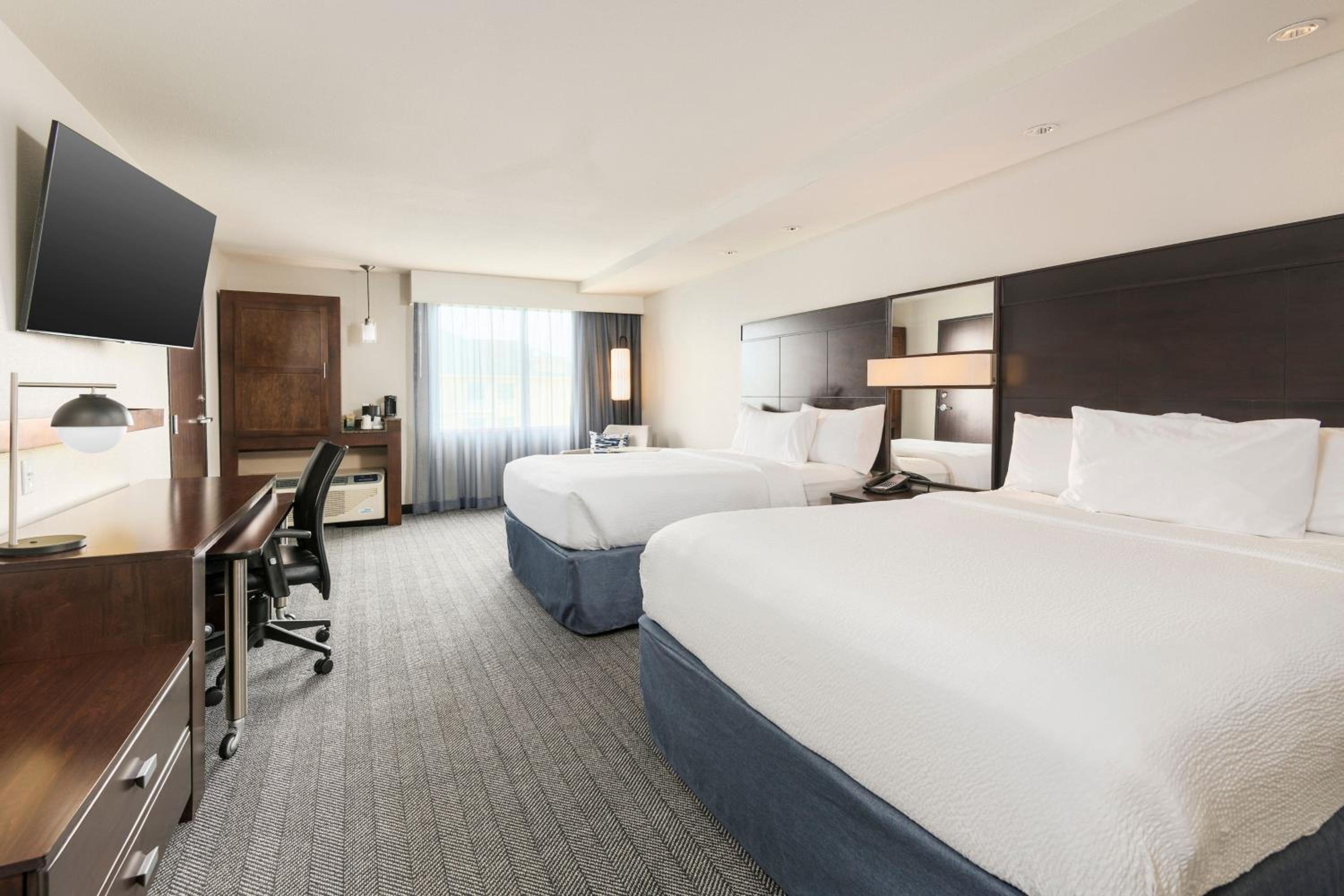 Queen Room with Two Queen Beds - Hearing Accessible photo 1