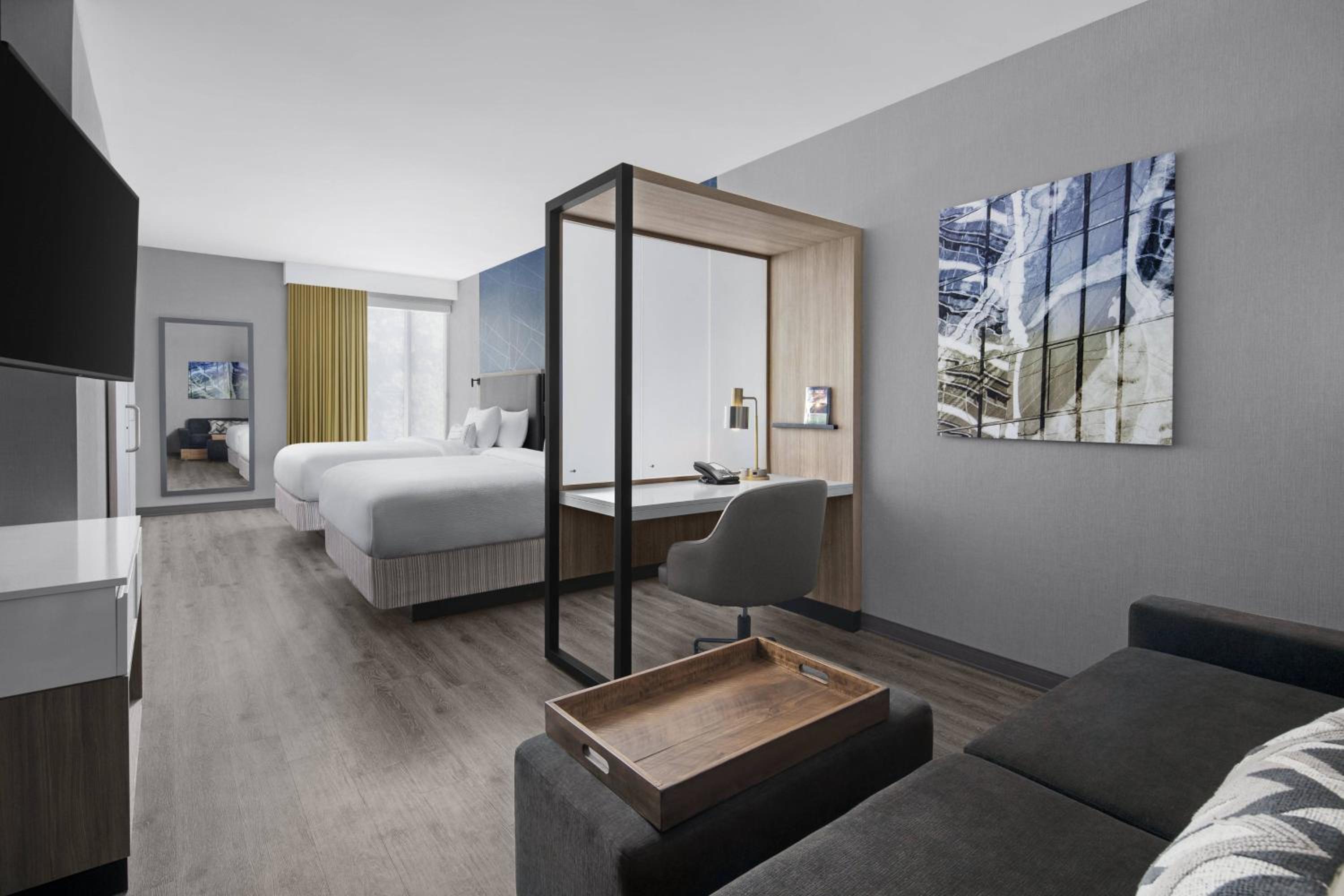 Queen Suite with Two Queen Beds and Trundle Sofa - Photo 1