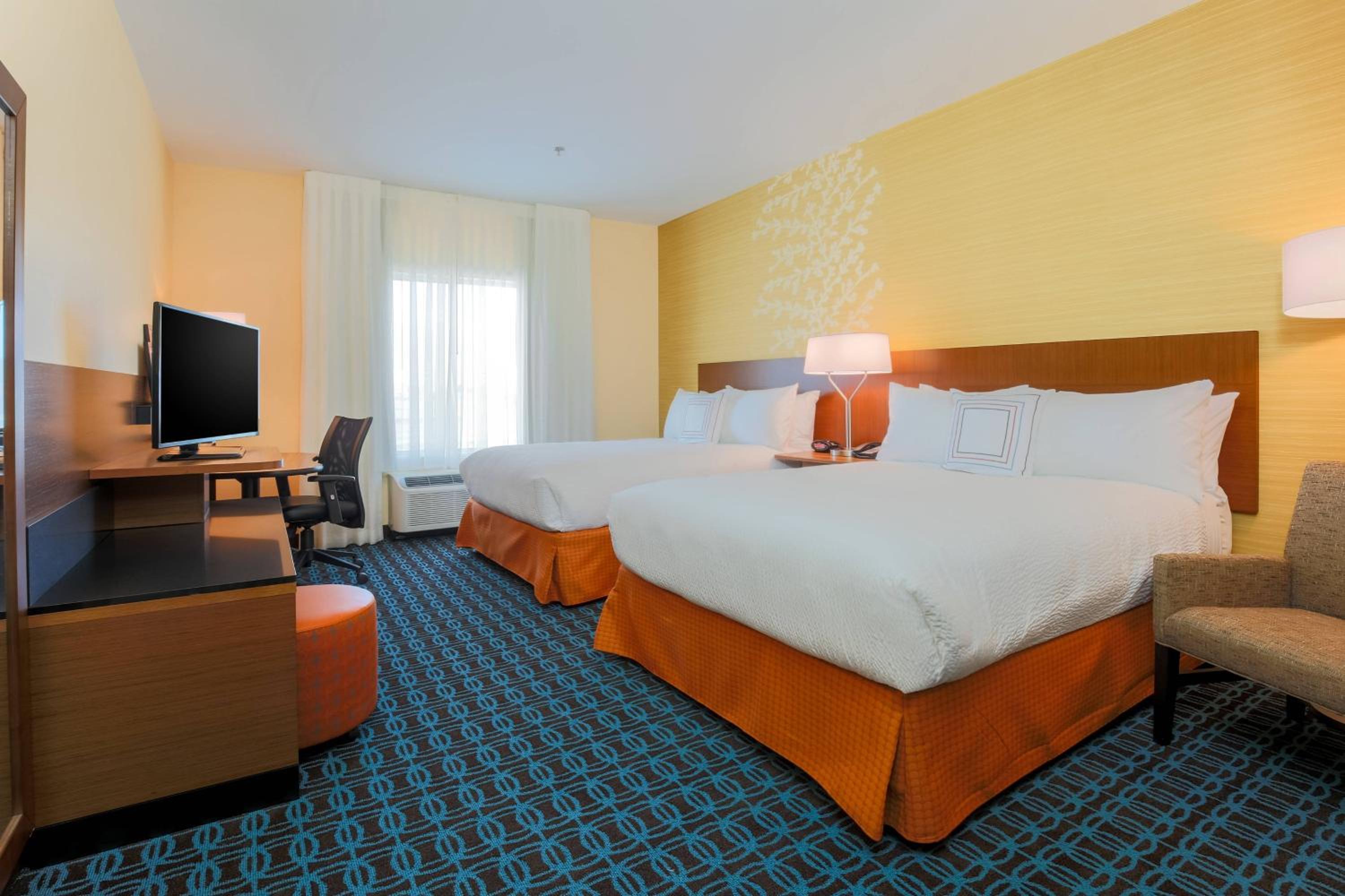 Queen Room with Two Queen Beds - Hearing Accessible photo 1