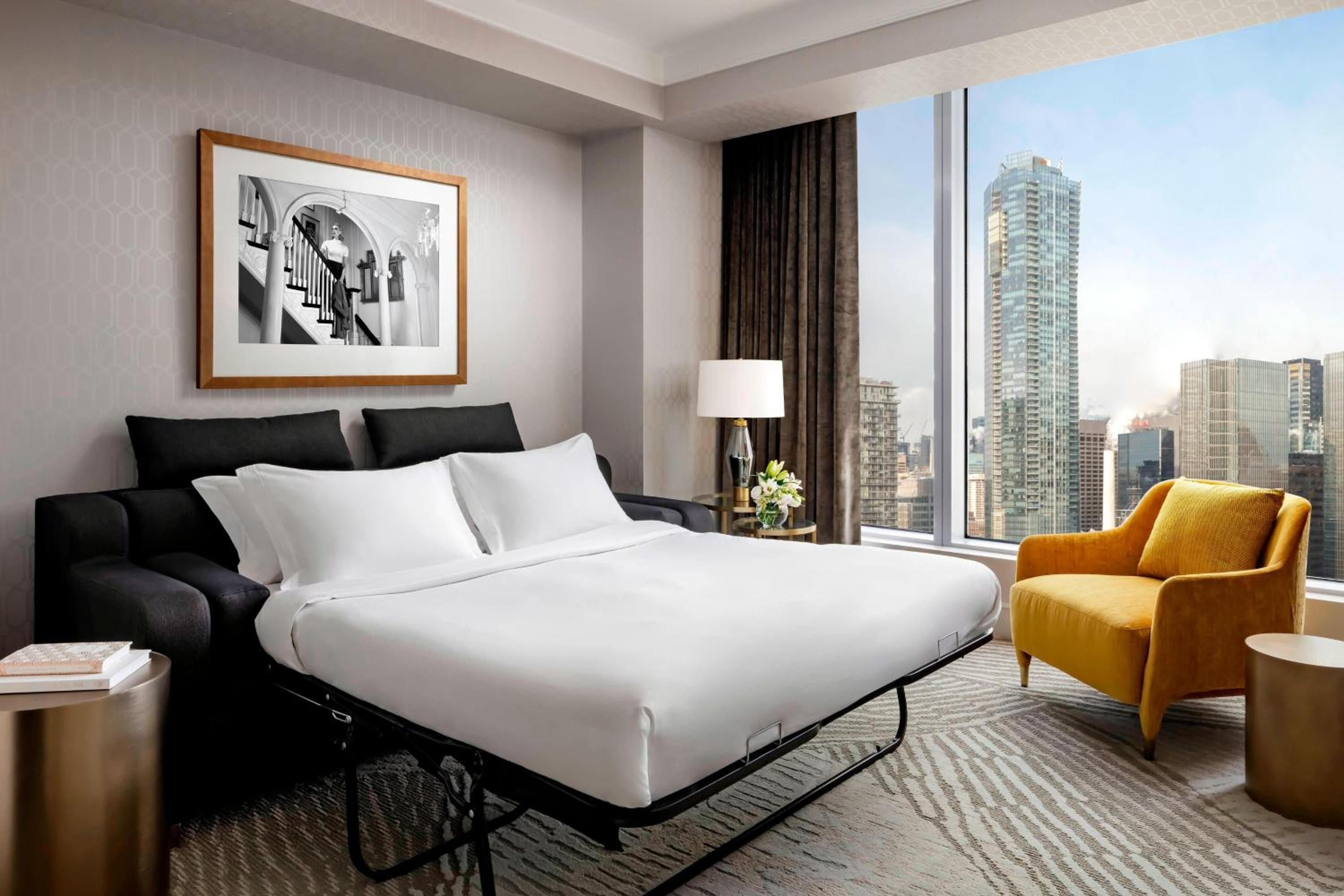 Club Lounge Access City View Corner Suite -1 King bed, living room with sofabed