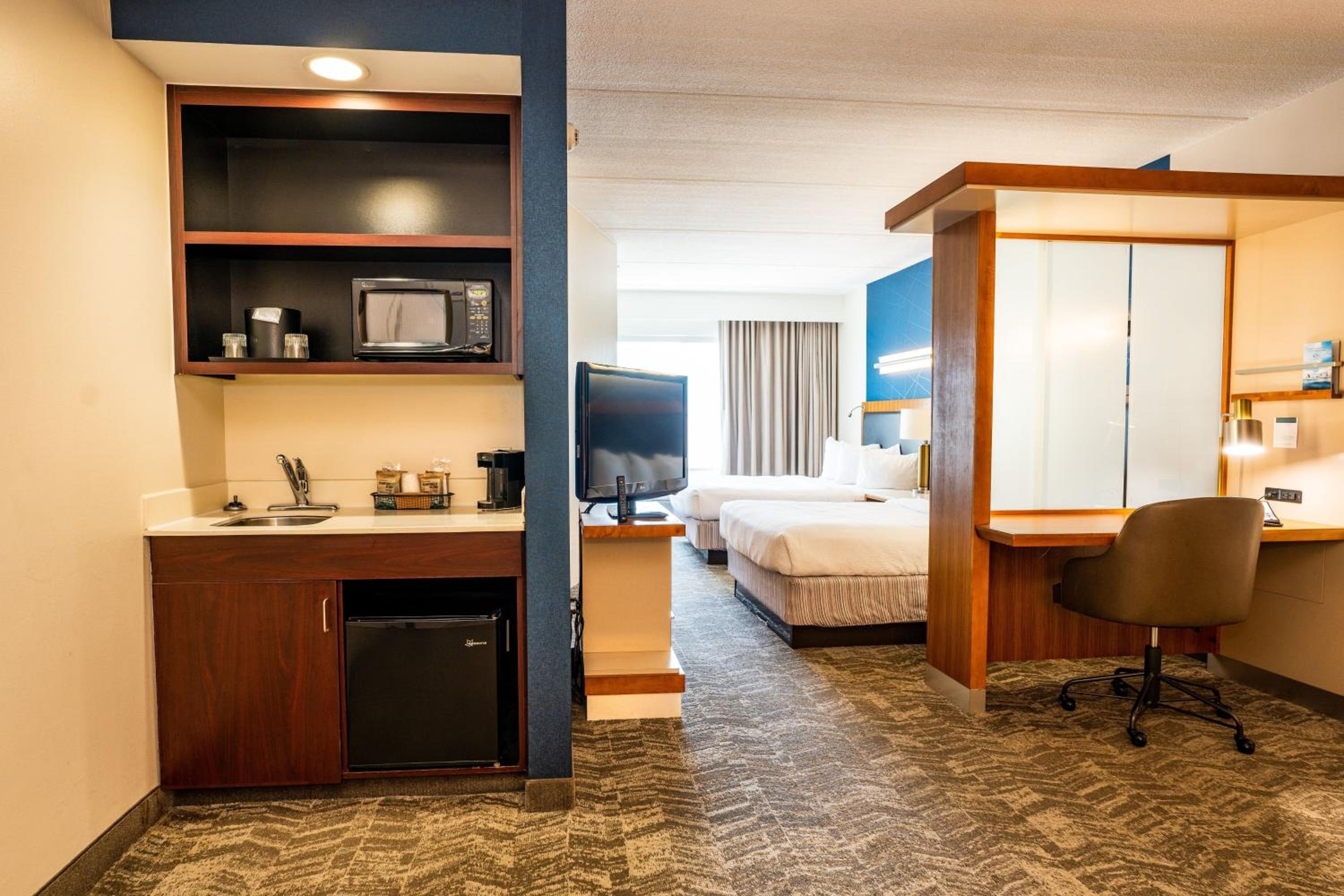 Queen Suite with Two Queen Beds and Sofa Bed - Photo 1