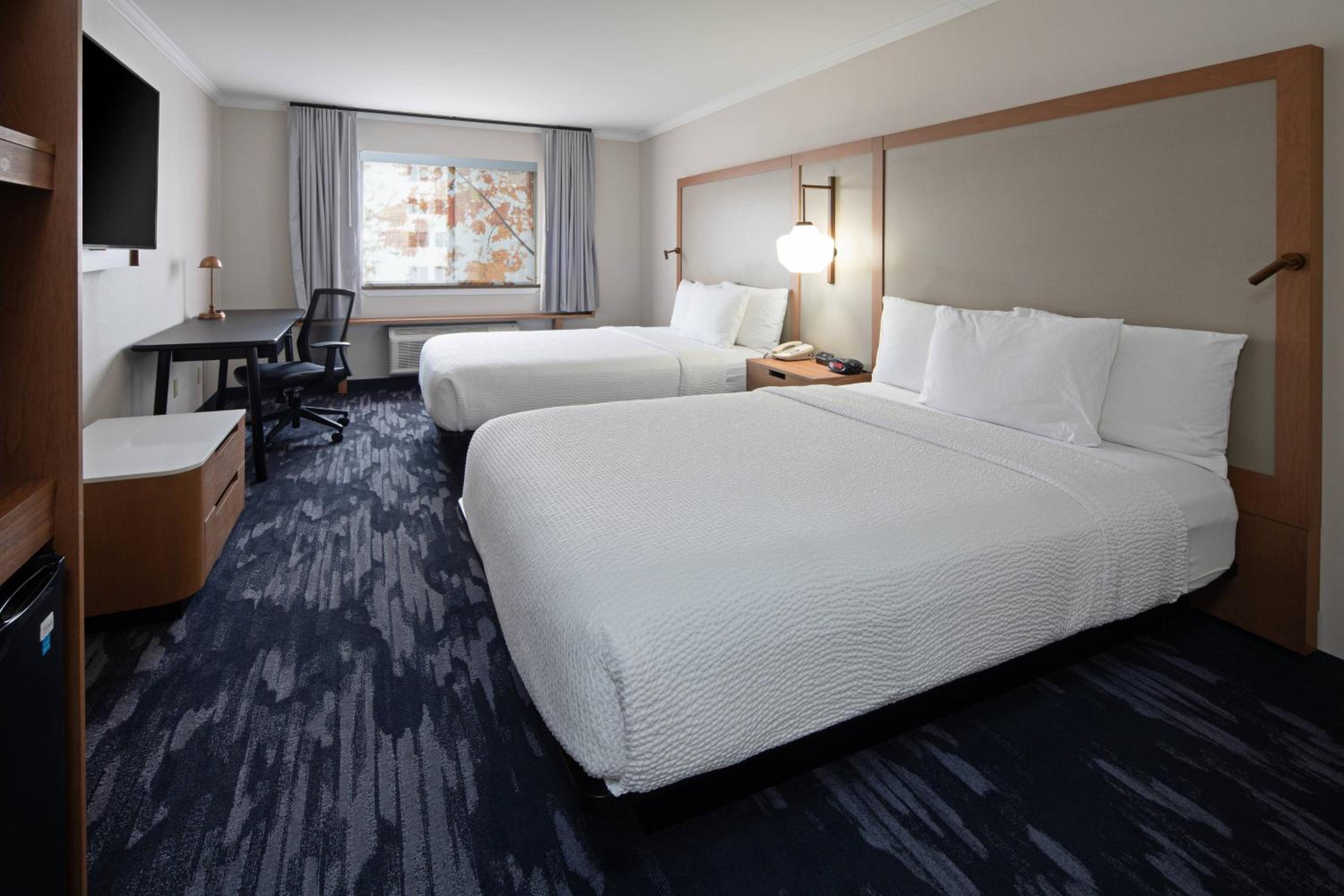 Queen Room with Two Queen Beds - Hearing Accessible photo 1
