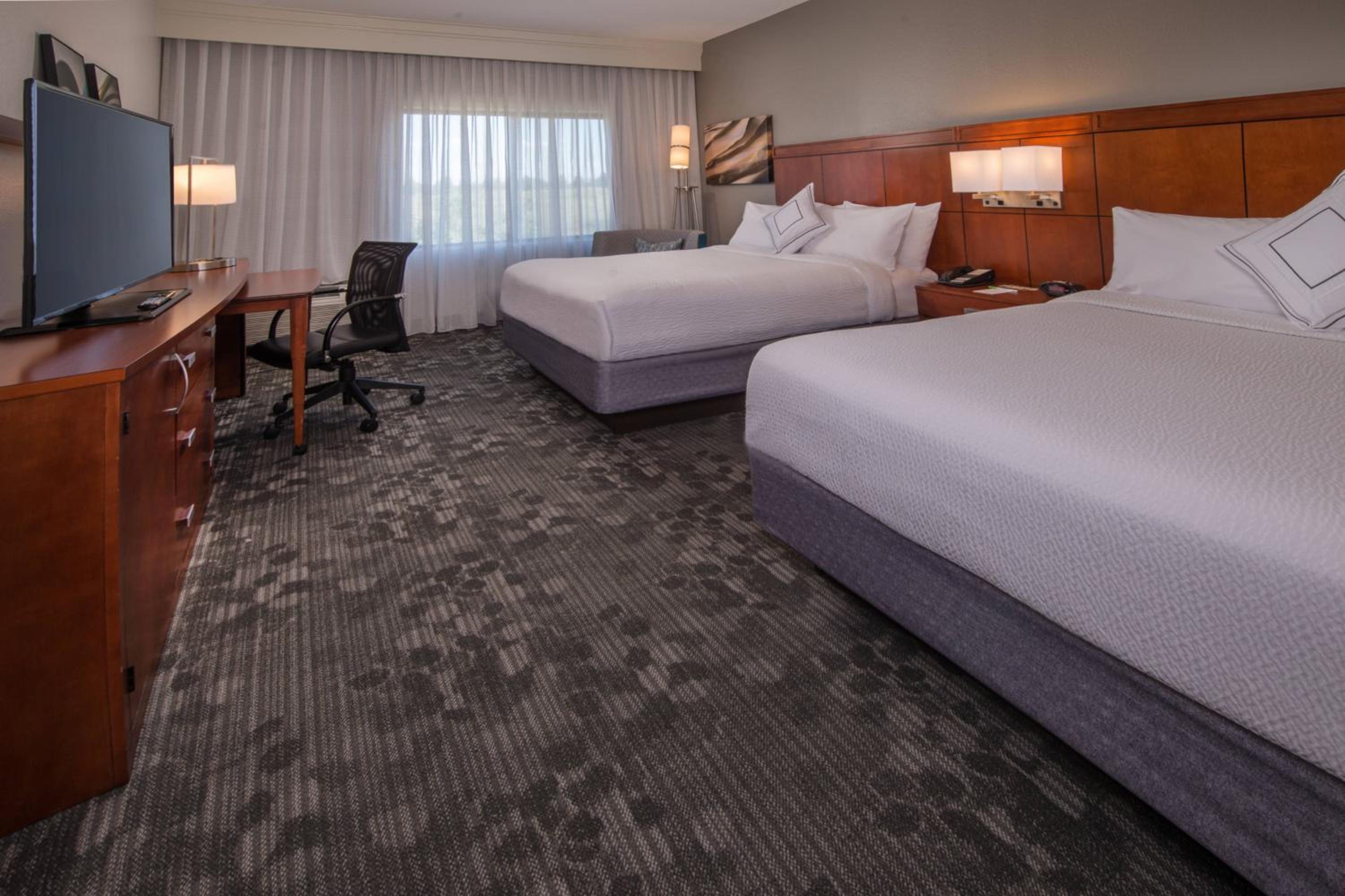 Queen Room with Two Queen Beds - Photo 1