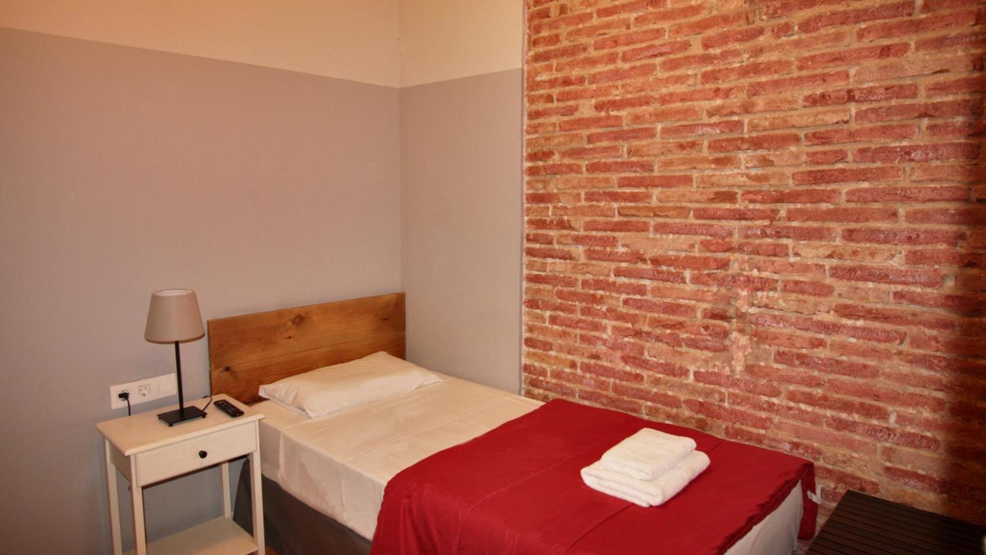 Habitación individual con baño compartido