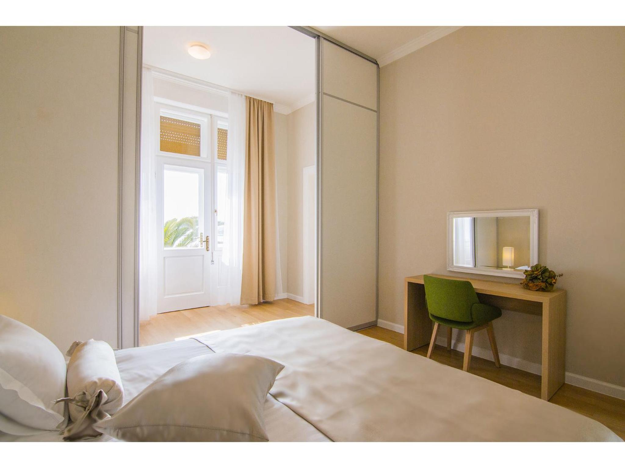 Luxury One-Bedroom Apartment with Balcony and Sea View