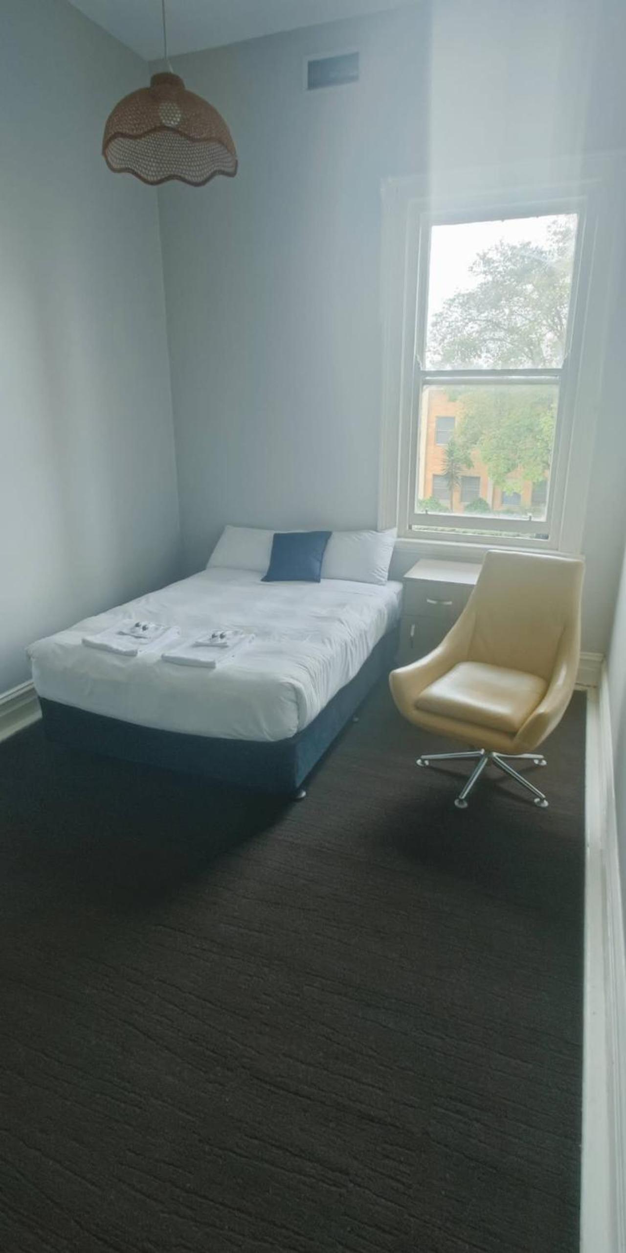 Single Room With Shared Shower And Toilet