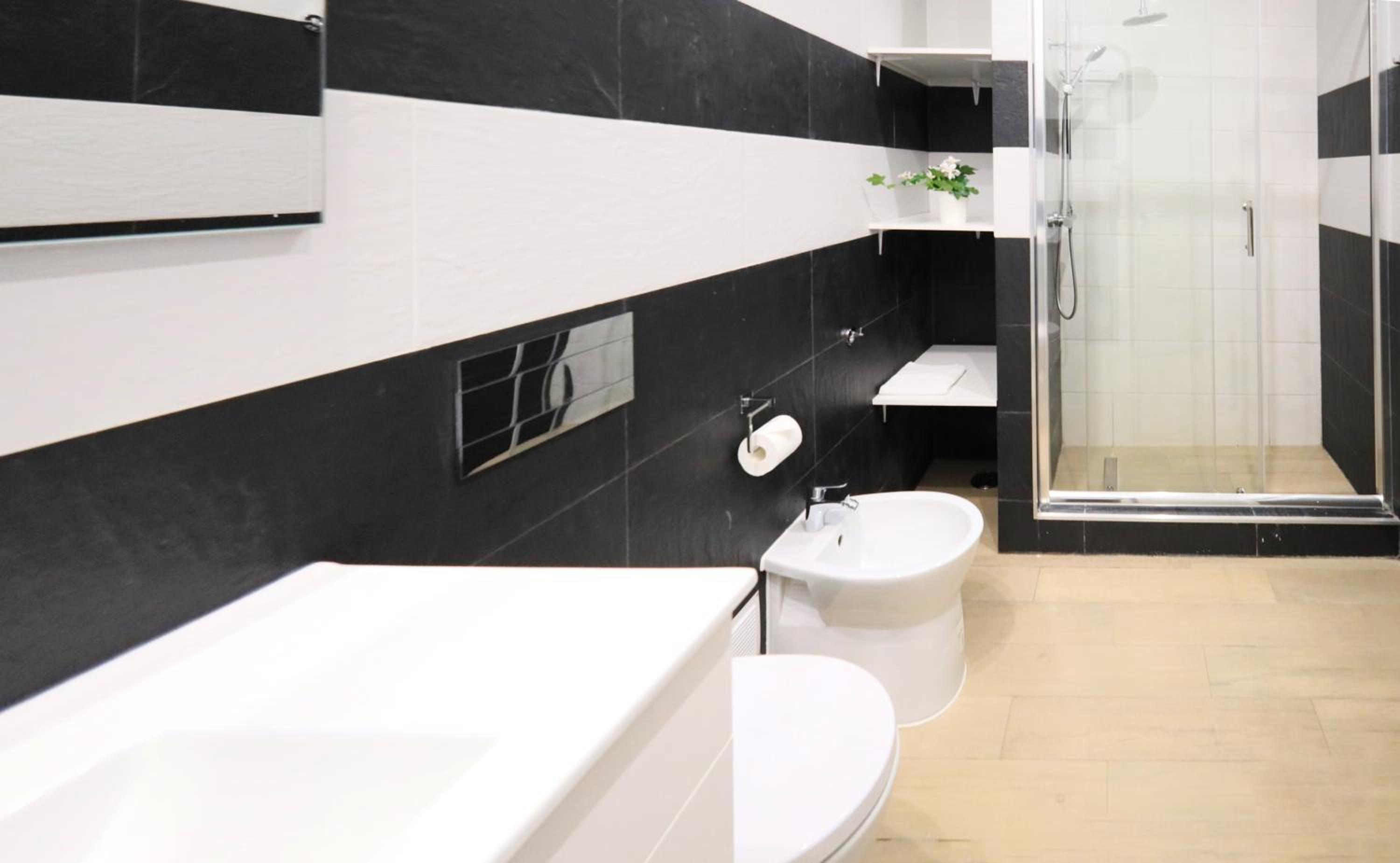 Three-Bedroom Apartment - Photo 16